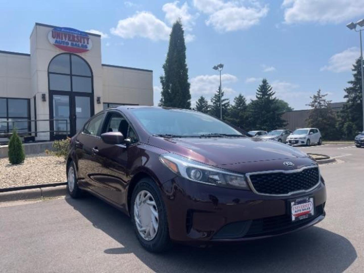 2017 Garnet Red /Black, cloth Kia Forte LX 6A (3KPFL4A76HE) with an 2.0L L4 DOHC 16V engine, 6-Speed Automatic transmission, located at 3301 W Hwy 13, Burnsville, MN, 55337, (952) 460-3200, 44.775333, -93.320808 - Photo#0