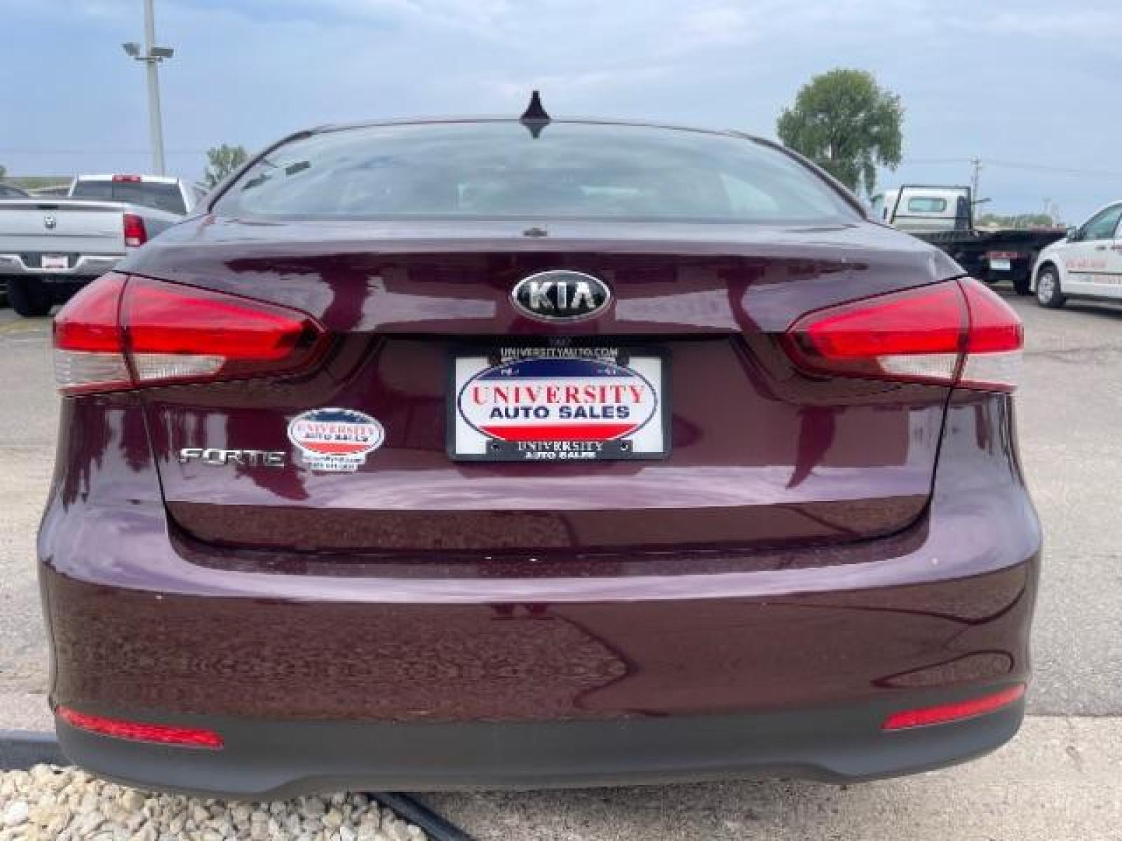 2017 Garnet Red /Black, cloth Kia Forte LX 6A (3KPFL4A76HE) with an 2.0L L4 DOHC 16V engine, 6-Speed Automatic transmission, located at 3301 W Hwy 13, Burnsville, MN, 55337, (952) 460-3200, 44.775333, -93.320808 - Photo #4