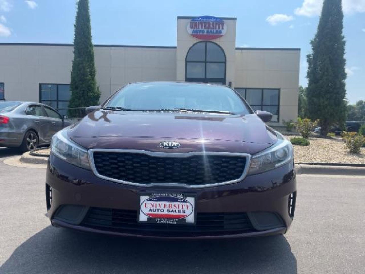 2017 Garnet Red /Black, cloth Kia Forte LX 6A (3KPFL4A76HE) with an 2.0L L4 DOHC 16V engine, 6-Speed Automatic transmission, located at 3301 W Hwy 13, Burnsville, MN, 55337, (952) 460-3200, 44.775333, -93.320808 - Photo#1