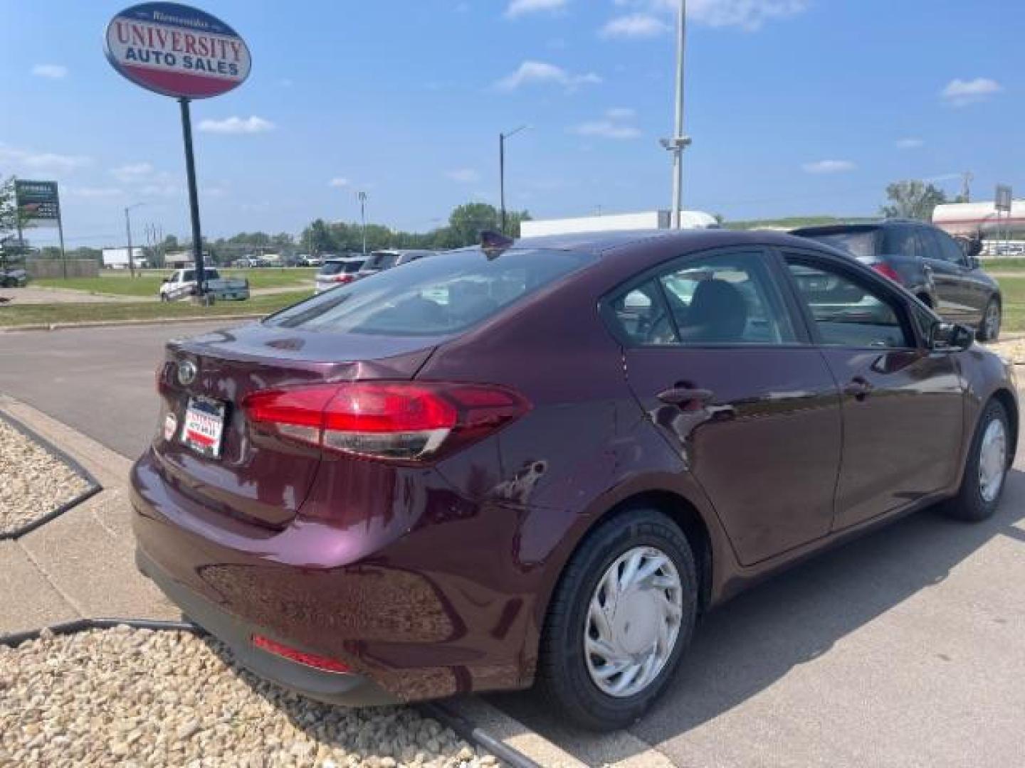 2017 Garnet Red /Black, cloth Kia Forte LX 6A (3KPFL4A76HE) with an 2.0L L4 DOHC 16V engine, 6-Speed Automatic transmission, located at 3301 W Hwy 13, Burnsville, MN, 55337, (952) 460-3200, 44.775333, -93.320808 - Photo#5