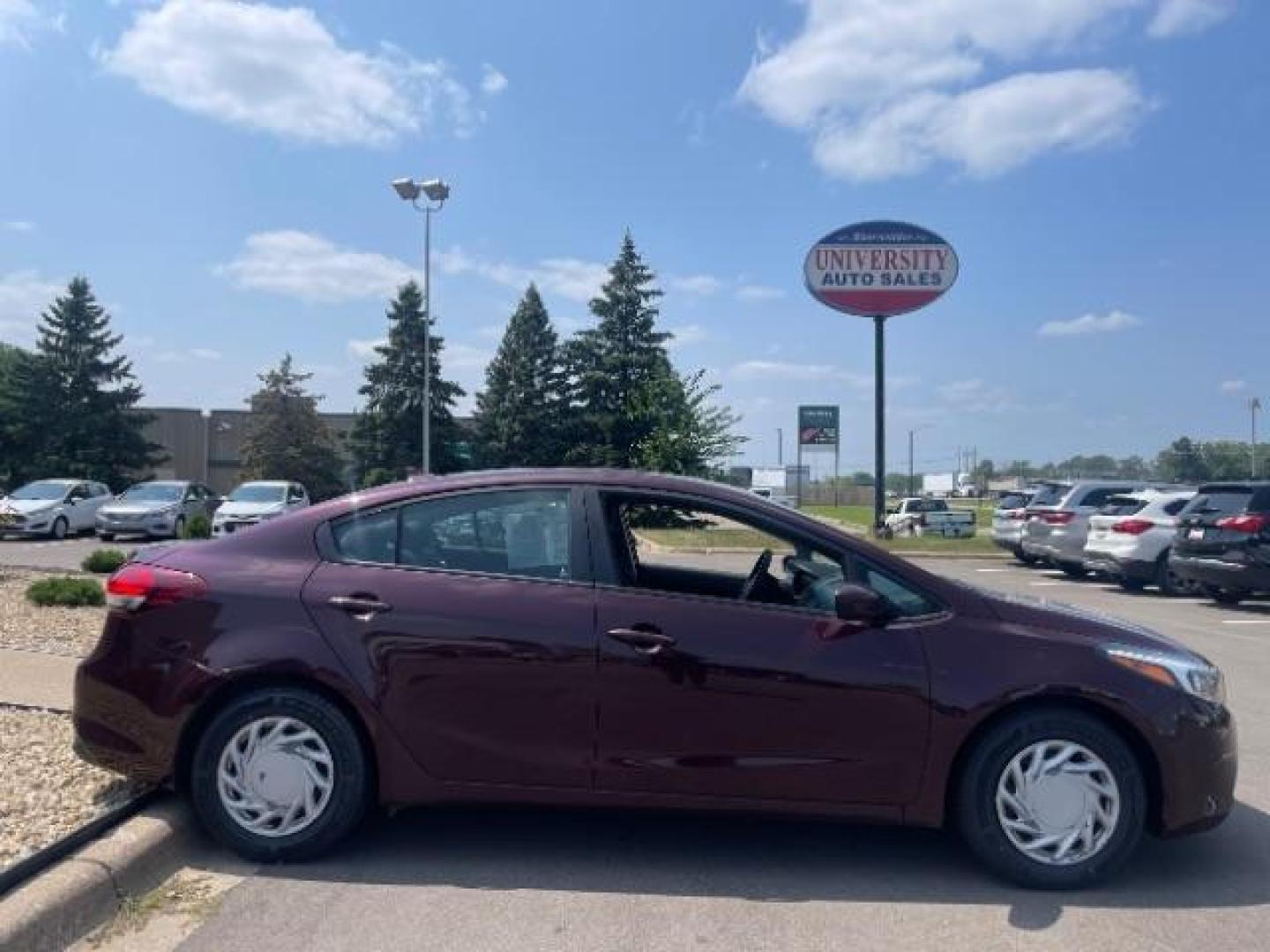 2017 Garnet Red /Black, cloth Kia Forte LX 6A (3KPFL4A76HE) with an 2.0L L4 DOHC 16V engine, 6-Speed Automatic transmission, located at 3301 W Hwy 13, Burnsville, MN, 55337, (952) 460-3200, 44.775333, -93.320808 - Photo#6