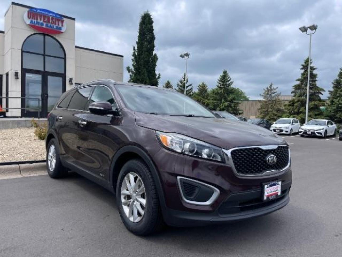 2016 Dark Cherry /Black, cloth Kia Sorento LX V6 AWD (5XYPGDA54GG) with an 3.3L V6 DOHC 24V engine, 6-Speed Automatic transmission, located at 3301 W Hwy 13, Burnsville, MN, 55337, (952) 460-3200, 44.775333, -93.320808 - Photo#0