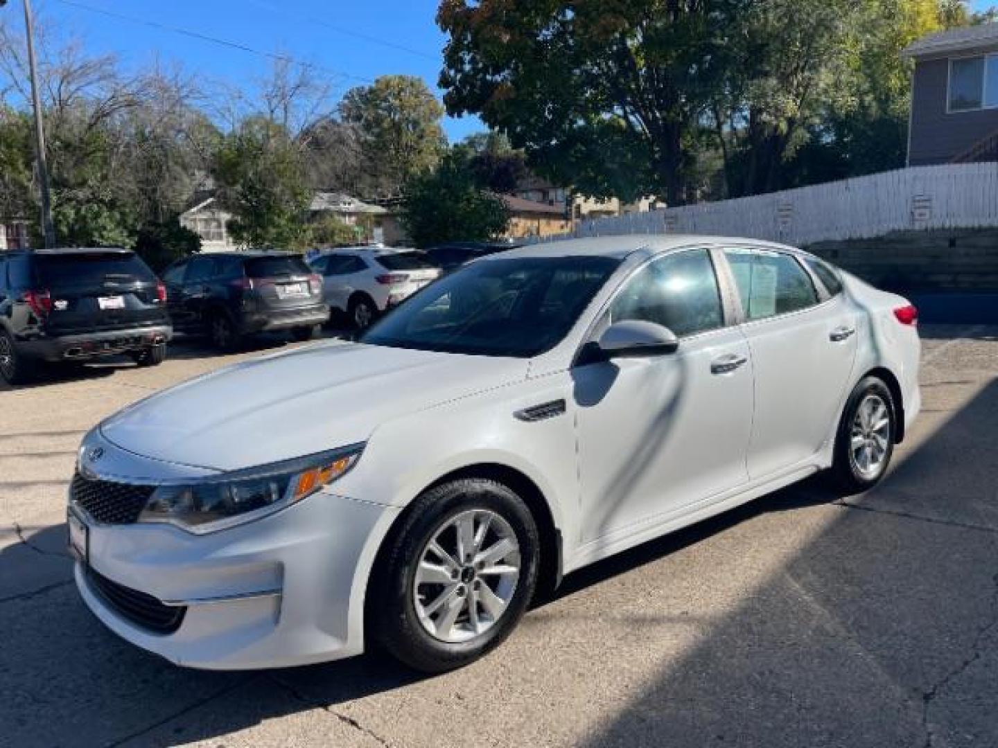 2017 Snow White Pearl Kia Optima LX (5XXGT4L3XHG) with an 2.4L L4 DOHC 16V engine, 6-Speed Automatic transmission, located at 745 S Robert St, St. Paul, MN, 55107, (651) 222-2991, 44.923389, -93.081215 - Photo#0
