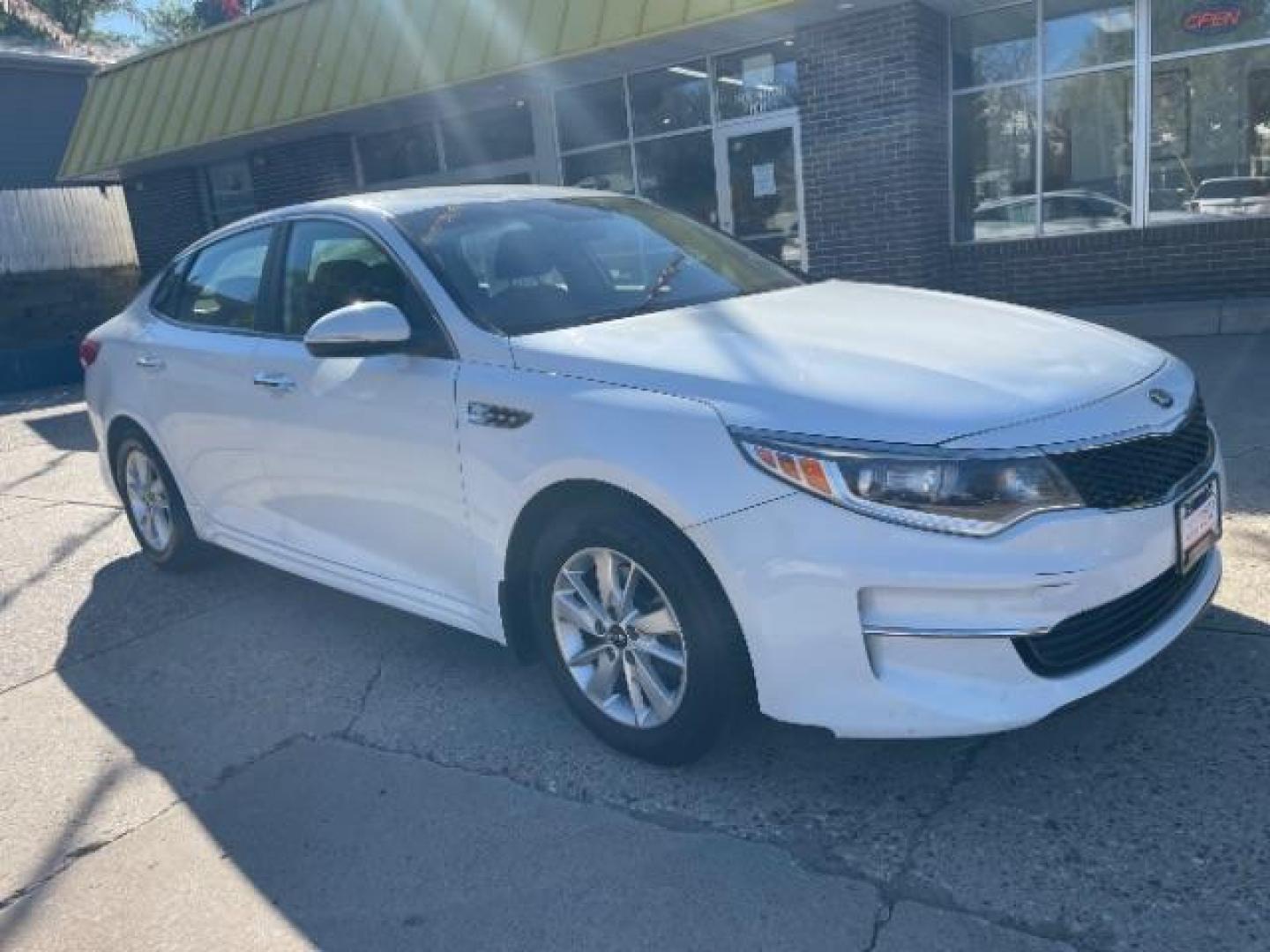 2017 Snow White Pearl Kia Optima LX (5XXGT4L3XHG) with an 2.4L L4 DOHC 16V engine, 6-Speed Automatic transmission, located at 745 S Robert St, St. Paul, MN, 55107, (651) 222-2991, 44.923389, -93.081215 - Photo#2