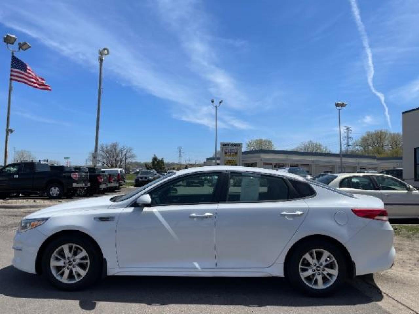 2017 Snow White Pearl Kia Optima LX (5XXGT4L3XHG) with an 2.4L L4 DOHC 16V engine, 6-Speed Automatic transmission, located at 3301 W Hwy 13, Burnsville, MN, 55337, (952) 460-3200, 44.775333, -93.320808 - Photo #2