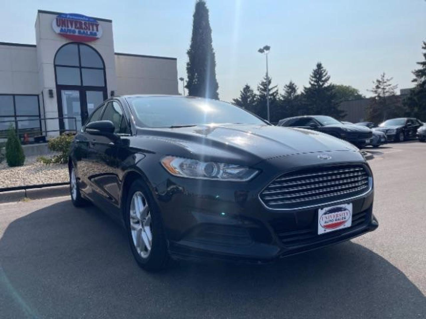 2016 Shadow Black Ford Fusion SE (3FA6P0HD4GR) with an 1.5L L4 DOHC 16V engine, 6-Speed Automatic transmission, located at 745 S Robert St, St. Paul, MN, 55107, (651) 222-2991, 44.923389, -93.081215 - Photo#0