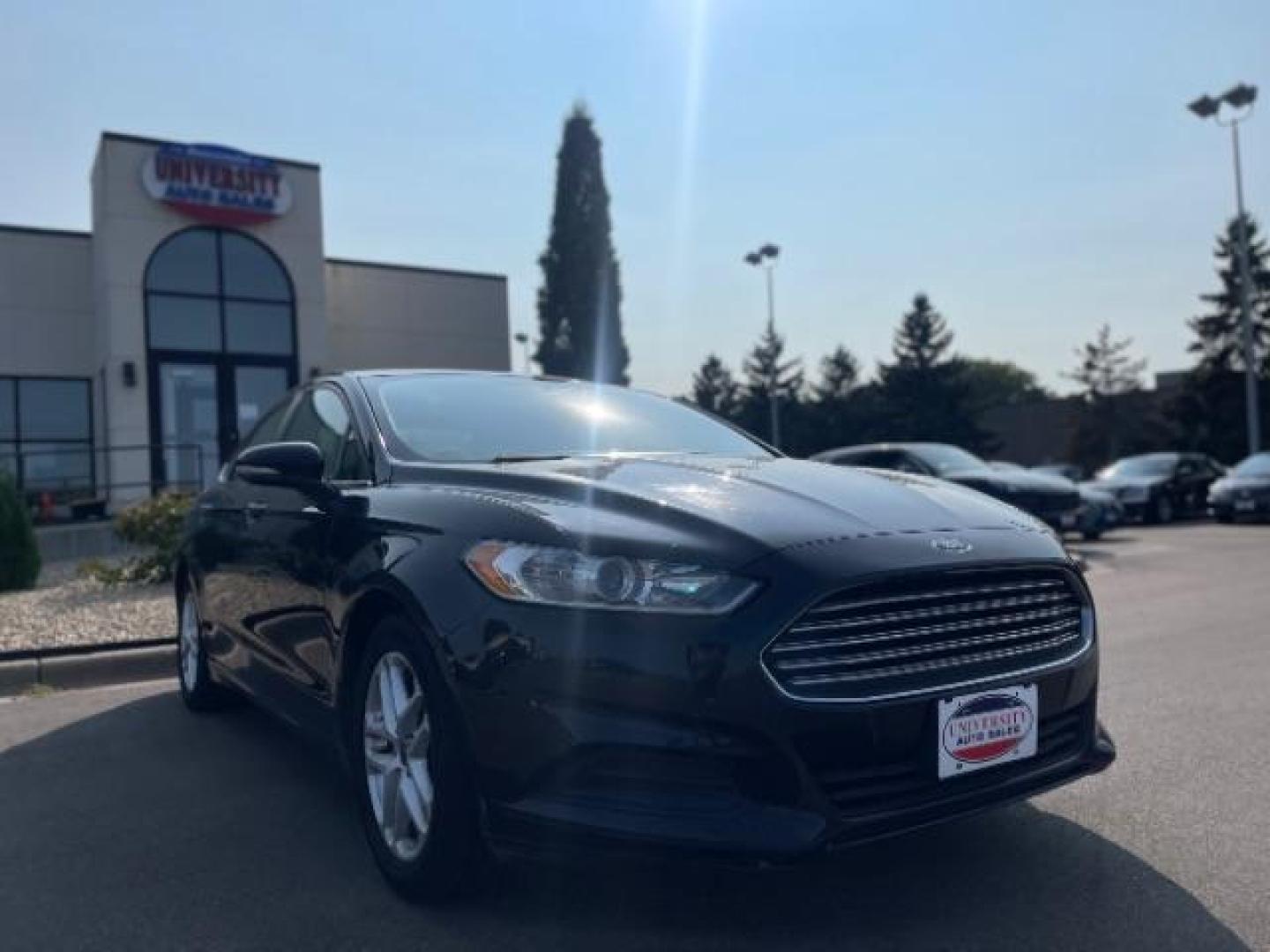 2016 Shadow Black Ford Fusion SE (3FA6P0HD4GR) with an 1.5L L4 DOHC 16V engine, 6-Speed Automatic transmission, located at 745 S Robert St, St. Paul, MN, 55107, (651) 222-2991, 44.923389, -93.081215 - Photo#2