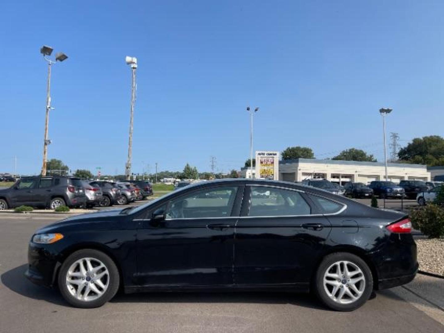 2016 Shadow Black Ford Fusion SE (3FA6P0HD4GR) with an 1.5L L4 DOHC 16V engine, 6-Speed Automatic transmission, located at 745 S Robert St, St. Paul, MN, 55107, (651) 222-2991, 44.923389, -93.081215 - Photo#5