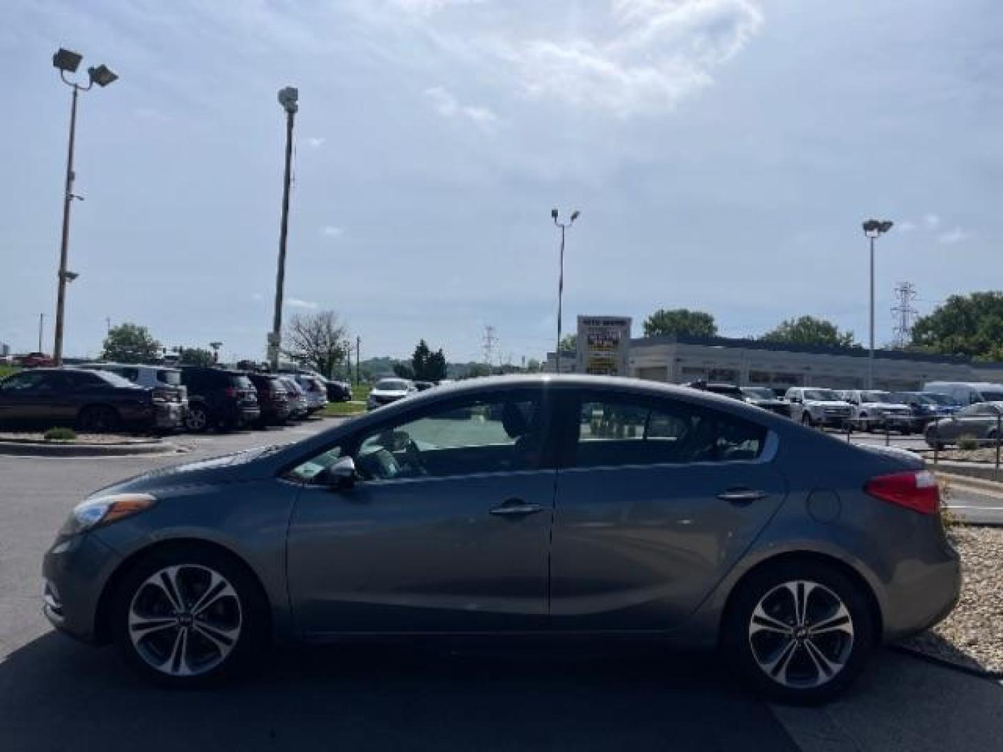 2016 Graphite Steel Kia Forte EX (KNAFX4A84G5) with an 2.0L L4 DOHC 16V engine, 6-Speed Automatic transmission, located at 3301 W Hwy 13, Burnsville, MN, 55337, (952) 460-3200, 44.775333, -93.320808 - Photo#4