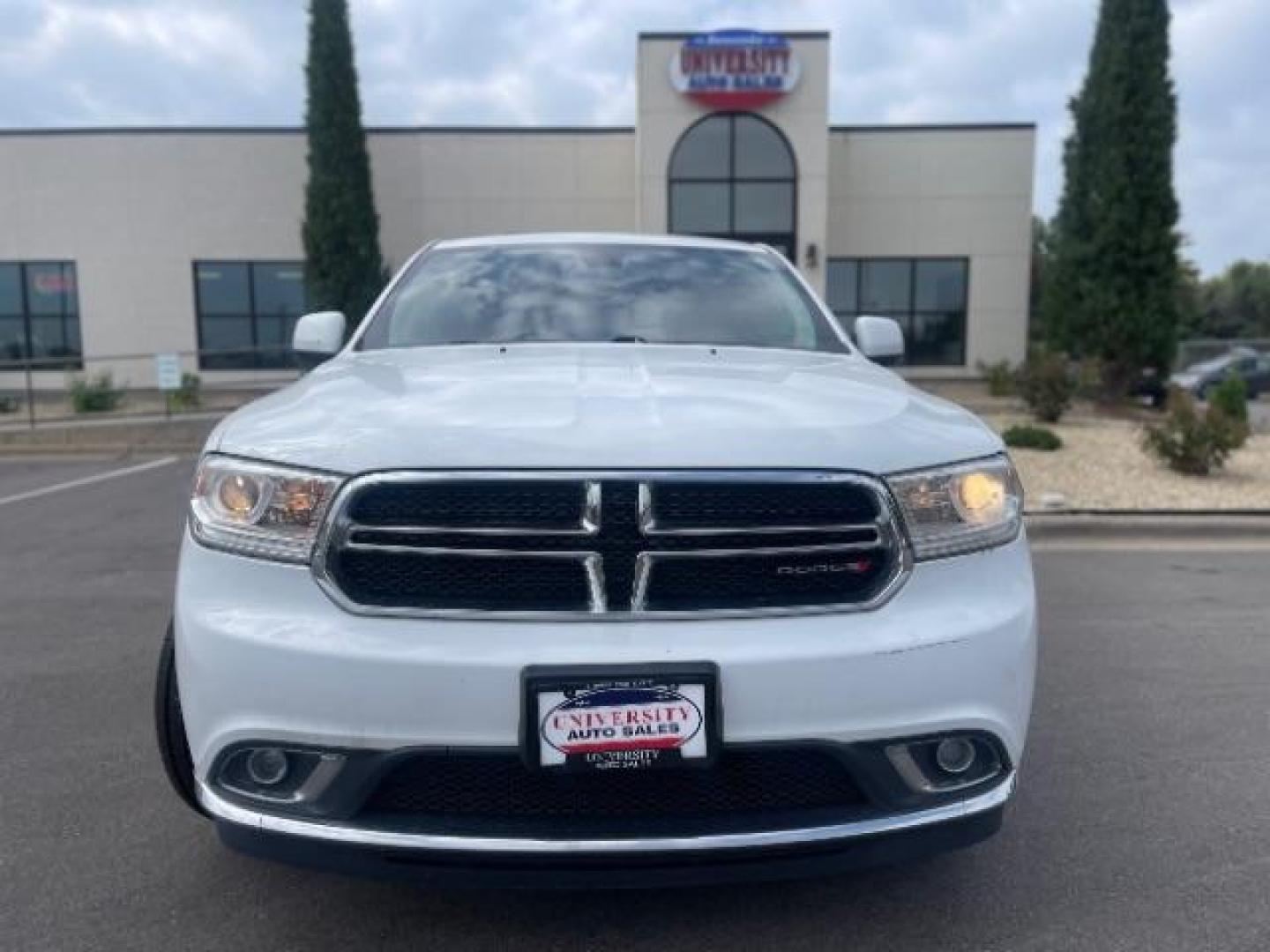 2014 Bright White Clearco /Black Dodge Durango SXT AWD (1C4RDJAG3EC) with an 3.6L V6 DOHC 24V engine, 8-Speed Automatic transmission, located at 3301 W Hwy 13, Burnsville, MN, 55337, (952) 460-3200, 44.775333, -93.320808 - Photo#1