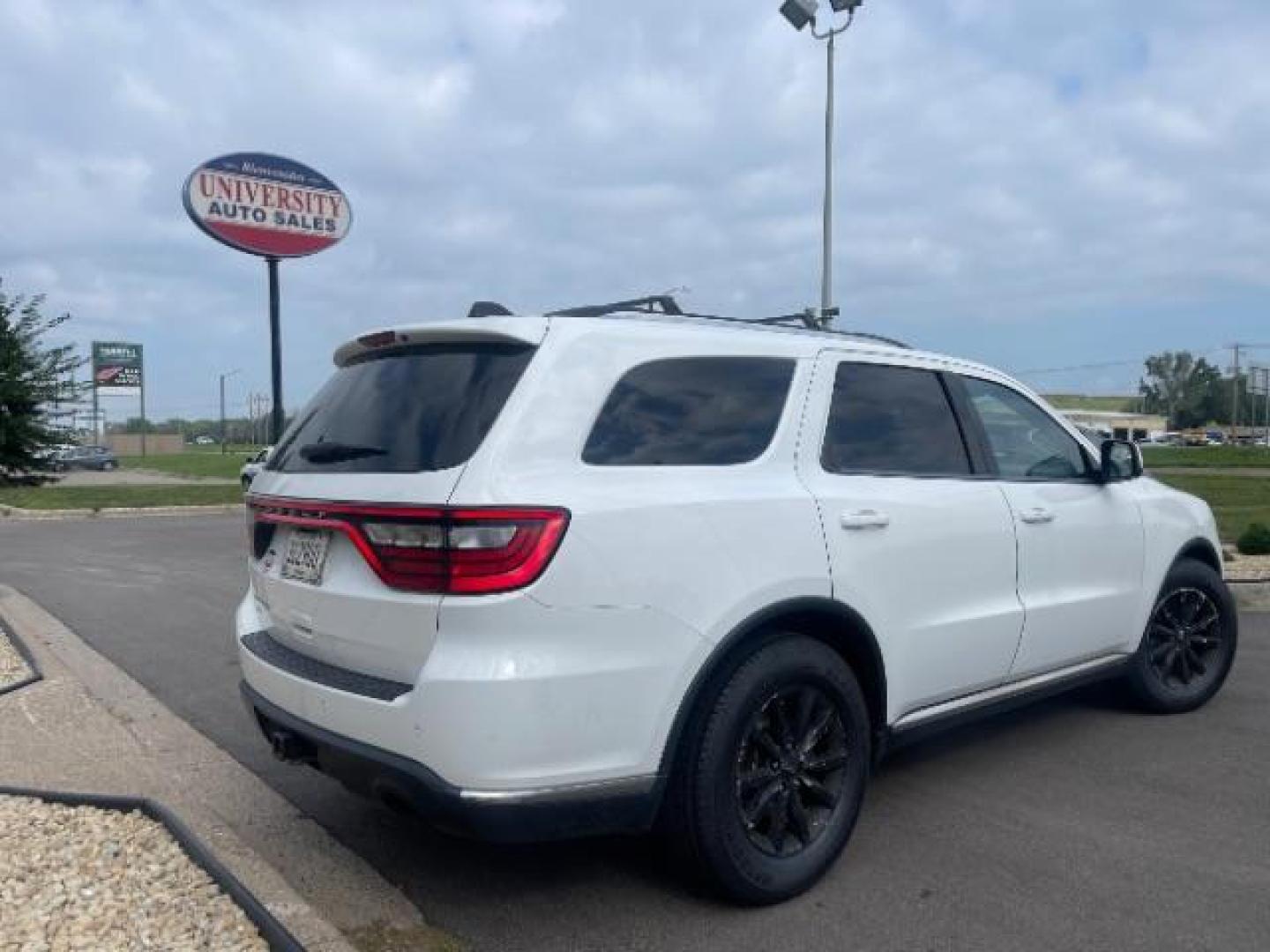 2014 Bright White Clearco /Black Dodge Durango SXT AWD (1C4RDJAG3EC) with an 3.6L V6 DOHC 24V engine, 8-Speed Automatic transmission, located at 3301 W Hwy 13, Burnsville, MN, 55337, (952) 460-3200, 44.775333, -93.320808 - Photo#2