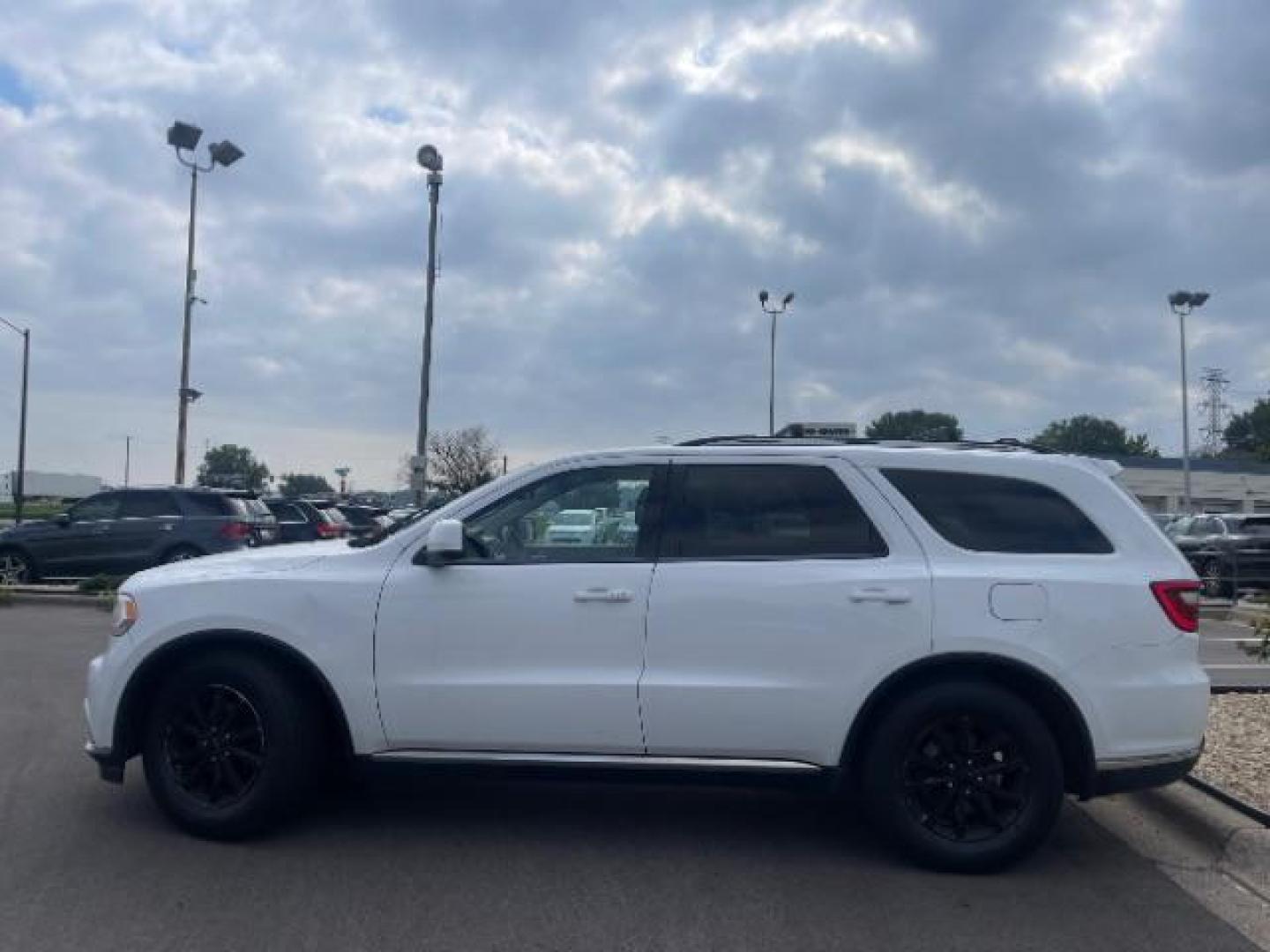 2014 Bright White Clearco /Black Dodge Durango SXT AWD (1C4RDJAG3EC) with an 3.6L V6 DOHC 24V engine, 8-Speed Automatic transmission, located at 3301 W Hwy 13, Burnsville, MN, 55337, (952) 460-3200, 44.775333, -93.320808 - Photo#3