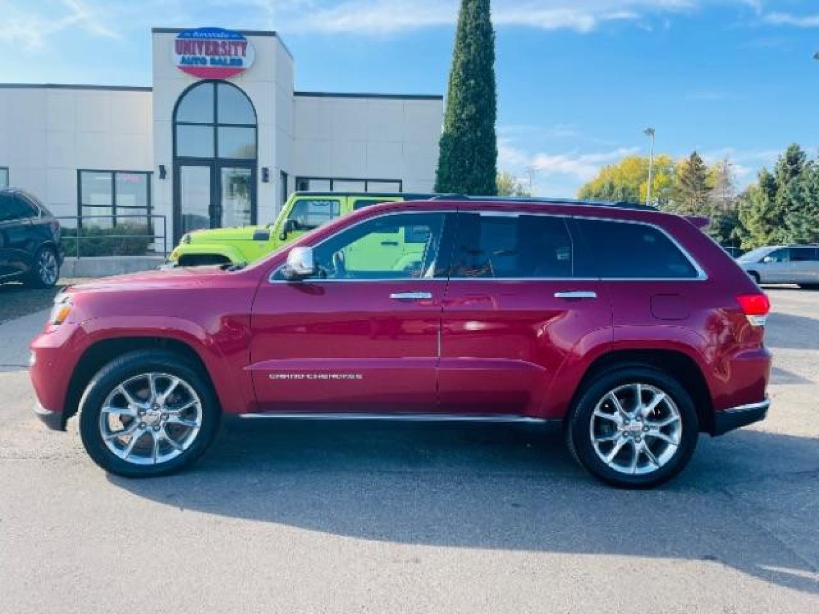2014 Dp Cherry Red Crysta Jeep Grand Cherokee Summit 4WD (1C4RJFJG7EC) with an 3.6L V6 DOHC 24V engine, 5-Speed Automatic transmission, located at 3301 W Hwy 13, Burnsville, MN, 55337, (952) 460-3200, 44.775333, -93.320808 - Photo #0