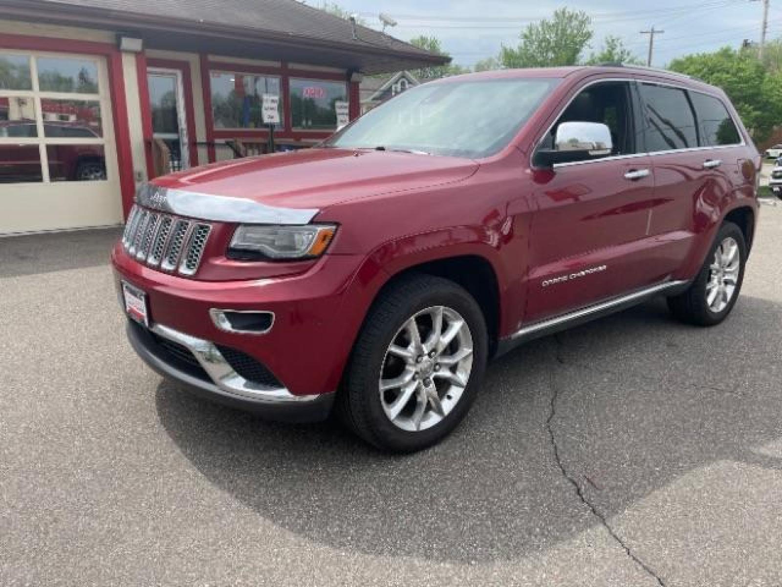 2014 Dp Cherry Red Crystal PC /Brown Jeep Grand Cherokee Summit 4WD (1C4RJFJG7EC) with an 3.6L V6 DOHC 24V engine, 5-Speed Automatic transmission, located at 834 West 7th Street, St. Paul, MN, 55102, (651) 797-6393, 44.930954, -93.121559 - Photo #4