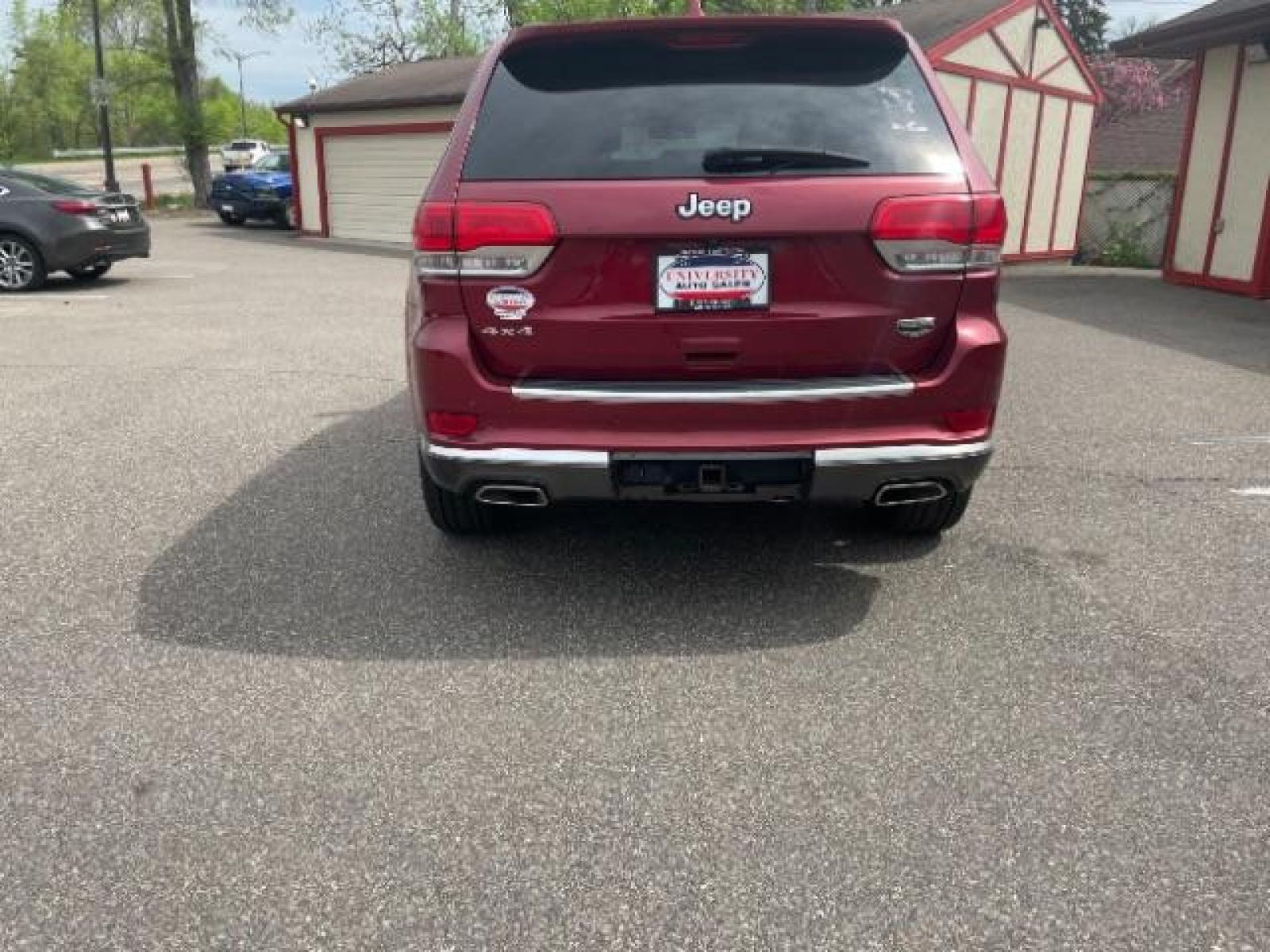 2014 Dp Cherry Red Crystal PC /Brown Jeep Grand Cherokee Summit 4WD (1C4RJFJG7EC) with an 3.6L V6 DOHC 24V engine, 5-Speed Automatic transmission, located at 834 West 7th Street, St. Paul, MN, 55102, (651) 797-6393, 44.930954, -93.121559 - Photo #5