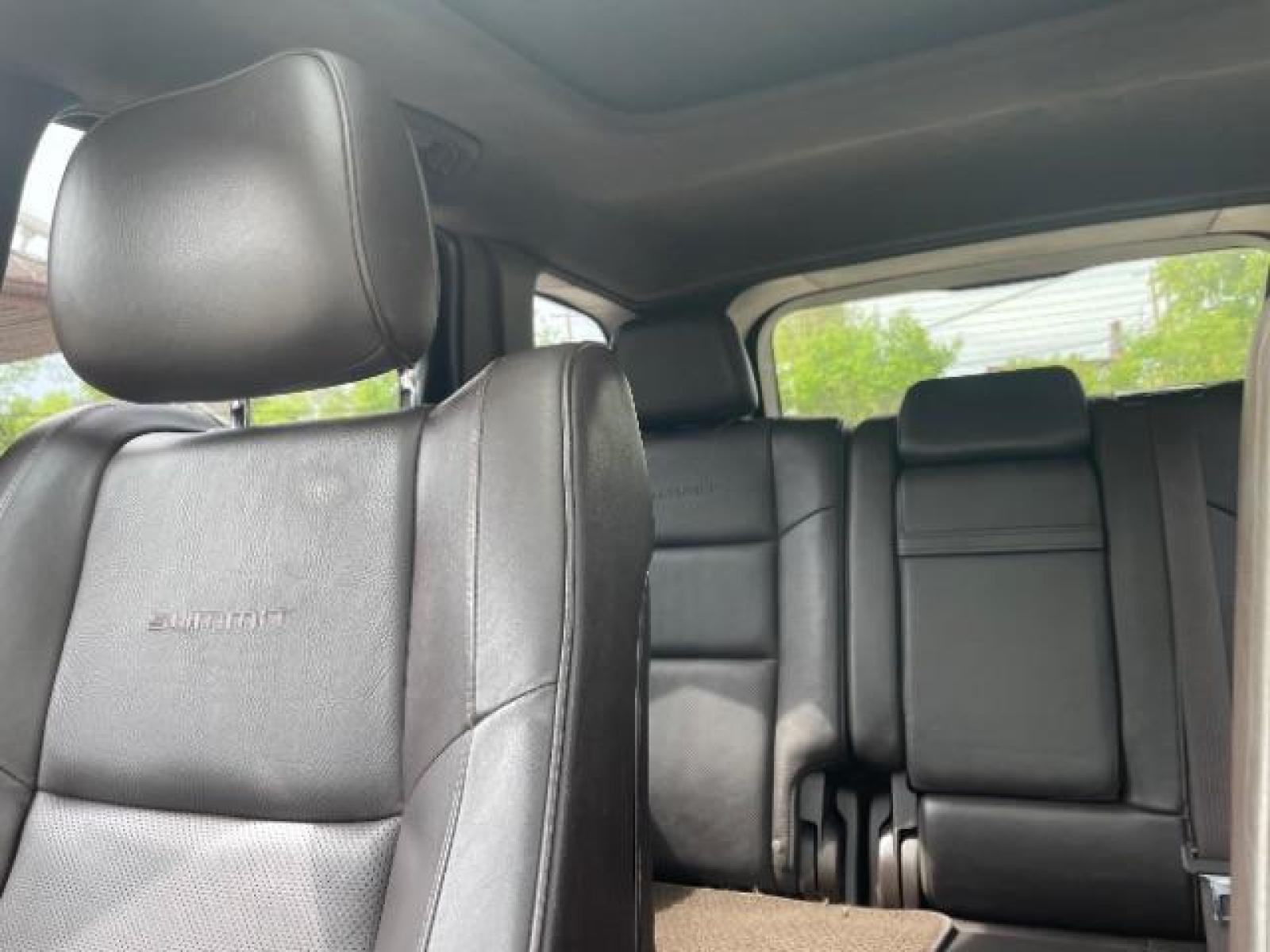 2014 Dp Cherry Red Crystal PC /Brown Jeep Grand Cherokee Summit 4WD (1C4RJFJG7EC) with an 3.6L V6 DOHC 24V engine, 5-Speed Automatic transmission, located at 834 West 7th Street, St. Paul, MN, 55102, (651) 797-6393, 44.930954, -93.121559 - Photo #6