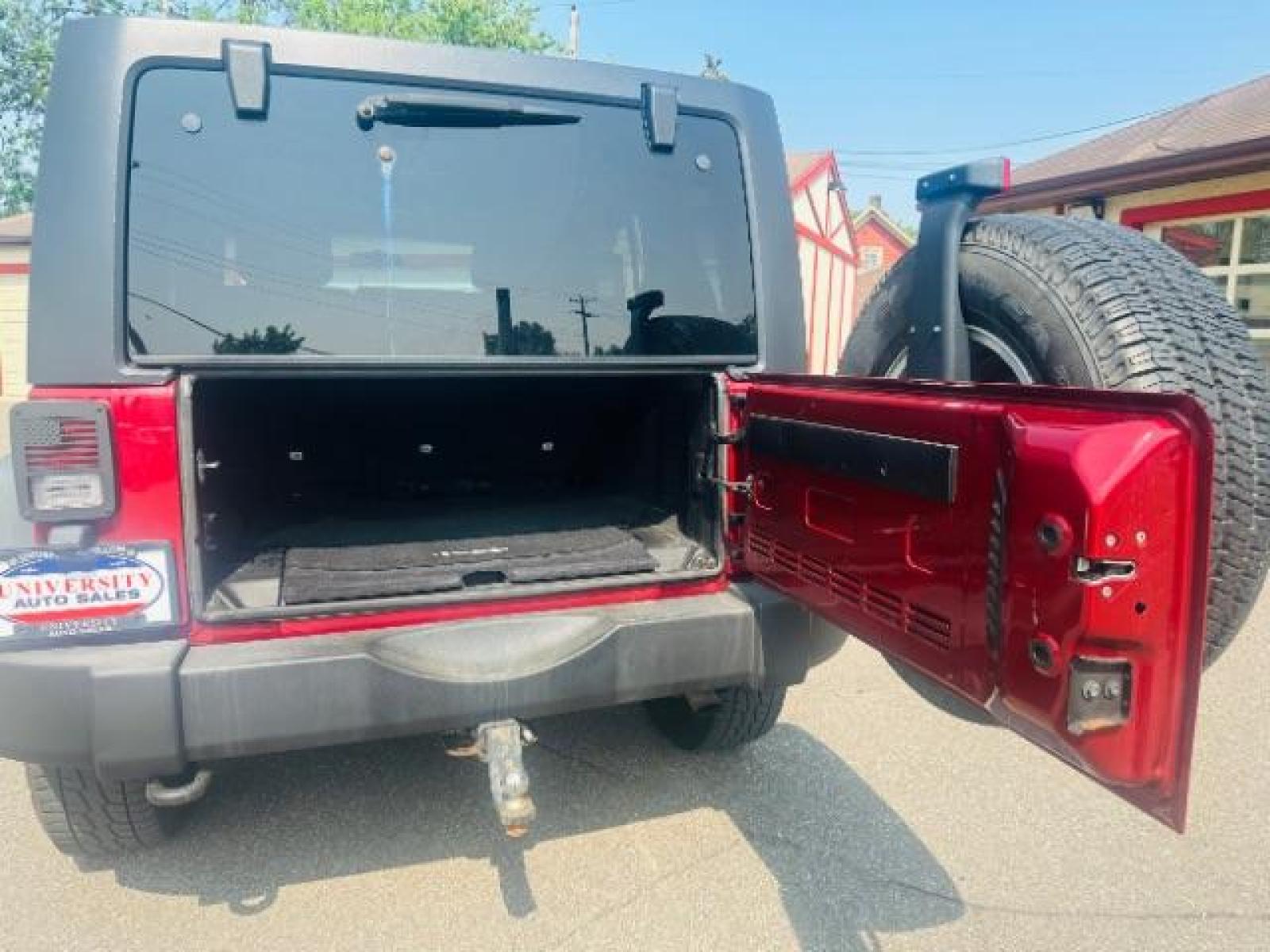 2011 Deep Cherry Red Crys Jeep Wrangler Unlimited Sport 4WD (1J4BA3H15BL) with an 3.8L V6 OHV 12V engine, located at 834 West 7th Street, St. Paul, MN, 55102, (651) 797-6393, 44.930954, -93.121559 - Photo #8