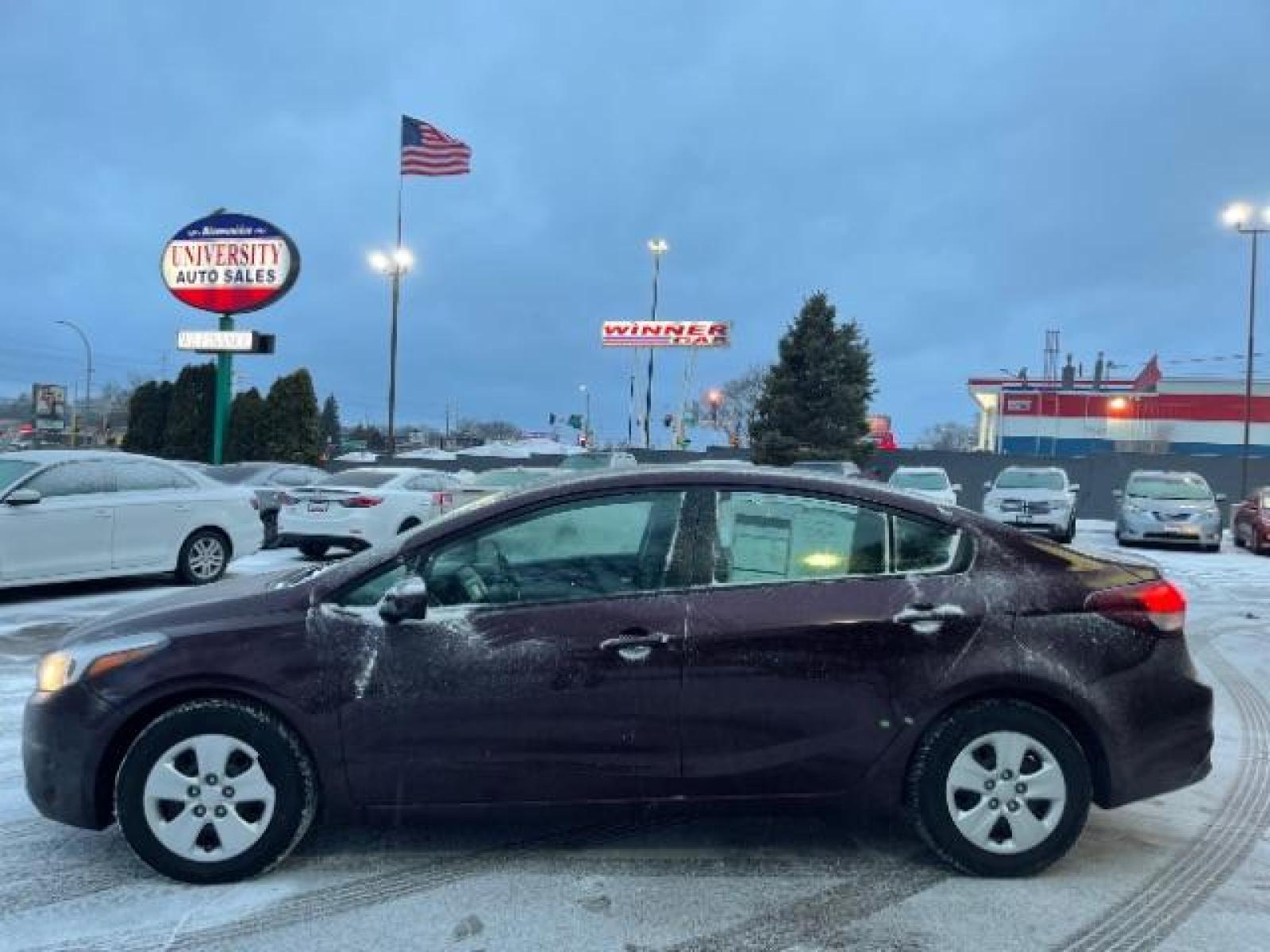 2017 Garnet Red Kia Forte LX 6A (3KPFL4A72HE) with an 2.0L L4 DOHC 16V engine, 6-Speed Automatic transmission, located at 745 S Robert St, St. Paul, MN, 55107, (651) 222-2991, 44.923389, -93.081215 - Photo #11
