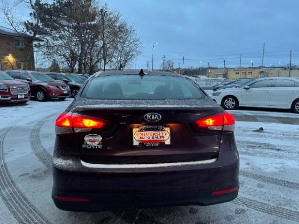 2017 Garnet Red Kia Forte LX 6A (3KPFL4A72HE) with an 2.0L L4 DOHC 16V engine, 6-Speed Automatic transmission, located at 3301 W Hwy 13, Burnsville, MN, 55337, (952) 460-3200, 44.775333, -93.320808 - Photo #3