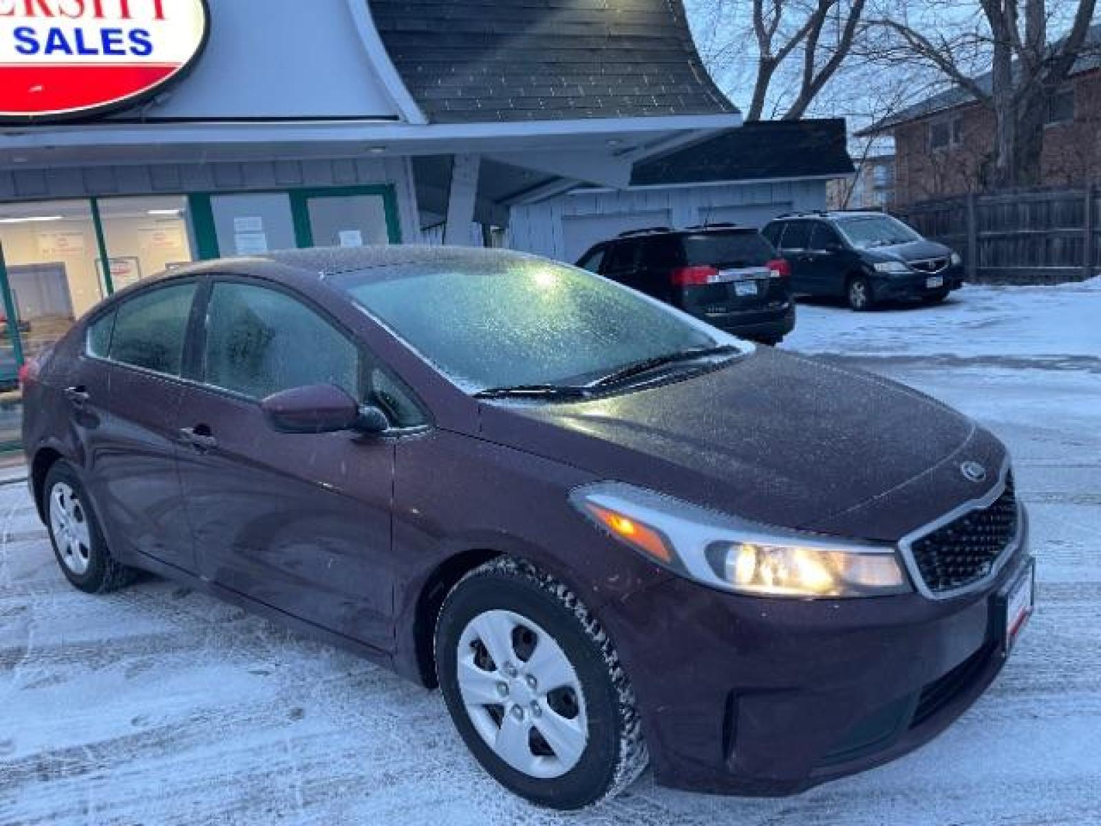 2017 Garnet Red Kia Forte LX 6A (3KPFL4A72HE) with an 2.0L L4 DOHC 16V engine, 6-Speed Automatic transmission, located at 745 S Robert St, St. Paul, MN, 55107, (651) 222-2991, 44.923389, -93.081215 - Photo #6