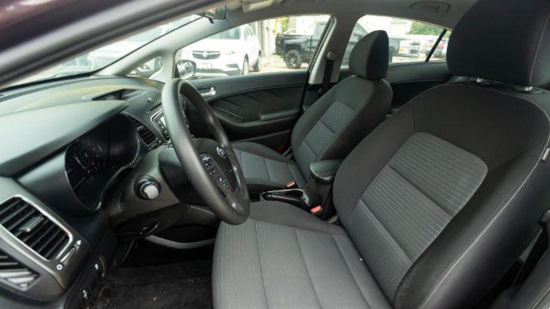 2017 Garnet Red Kia Forte LX 6A (3KPFL4A72HE) with an 2.0L L4 DOHC 16V engine, 6-Speed Automatic transmission, located at 745 S Robert St, St. Paul, MN, 55107, (651) 222-2991, 44.923389, -93.081215 - Photo#7