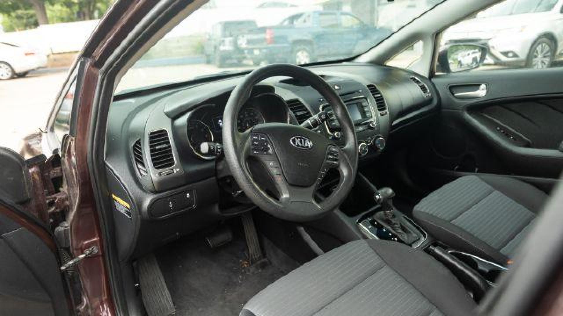 2017 Garnet Red Kia Forte LX 6A (3KPFL4A72HE) with an 2.0L L4 DOHC 16V engine, 6-Speed Automatic transmission, located at 745 S Robert St, St. Paul, MN, 55107, (651) 222-2991, 44.923389, -93.081215 - Photo#6