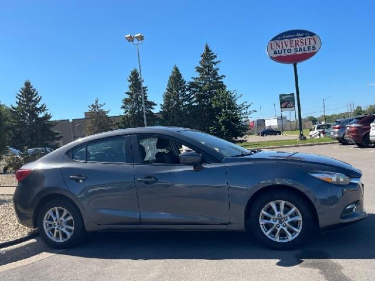 2018 Machine Gray Metalli Mazda MAZDA3 i Sport AT 4-Door (3MZBN1U77JM) with an 2.0L L4 DOHC 16V engine, 6-Speed Automatic transmission, located at 745 S Robert St, St. Paul, MN, 55107, (651) 222-2991, 44.923389, -93.081215 - Photo#3