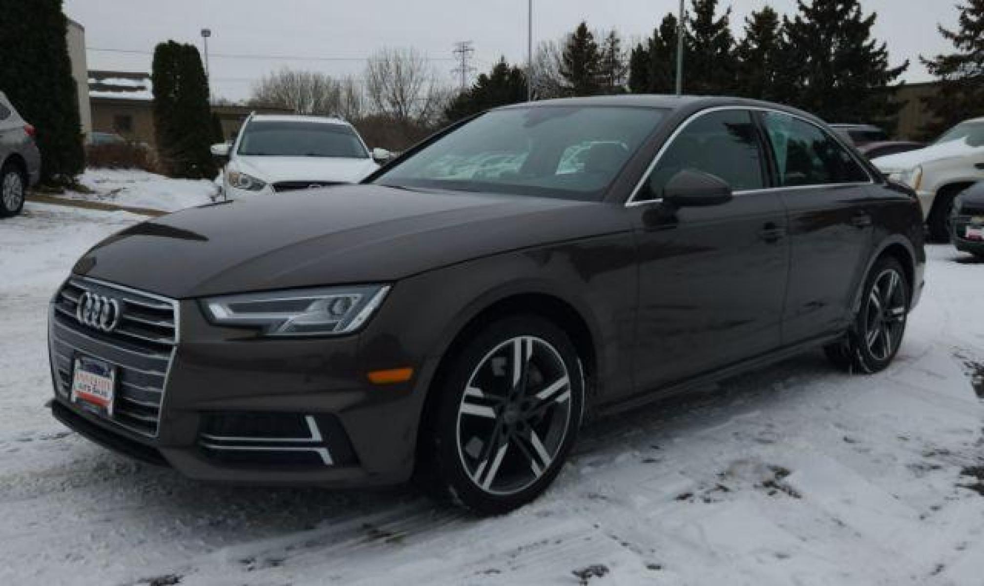 2017 Argus Brown Metallic /Atlas Beige/Gray, leather Audi A4 2.0T Premium Plus quattro Sedan (WAUENAF4XHN) with an 2.0L L4 DOHC 16V TURBO engine, 8-Speed Automatic transmission, located at 3301 W Hwy 13, Burnsville, MN, 55337, (952) 460-3200, 44.775333, -93.320808 - Photo #2