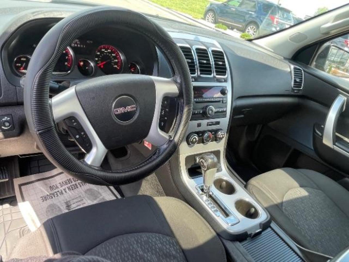 2012 Carbon Black Metalli GMC Acadia SLE-2 AWD (1GKKVPED3CJ) with an 3.6L V6 DOHC 24V engine, 6-Speed Automatic transmission, located at 3301 W Hwy 13, Burnsville, MN, 55337, (952) 460-3200, 44.775333, -93.320808 - Photo#10