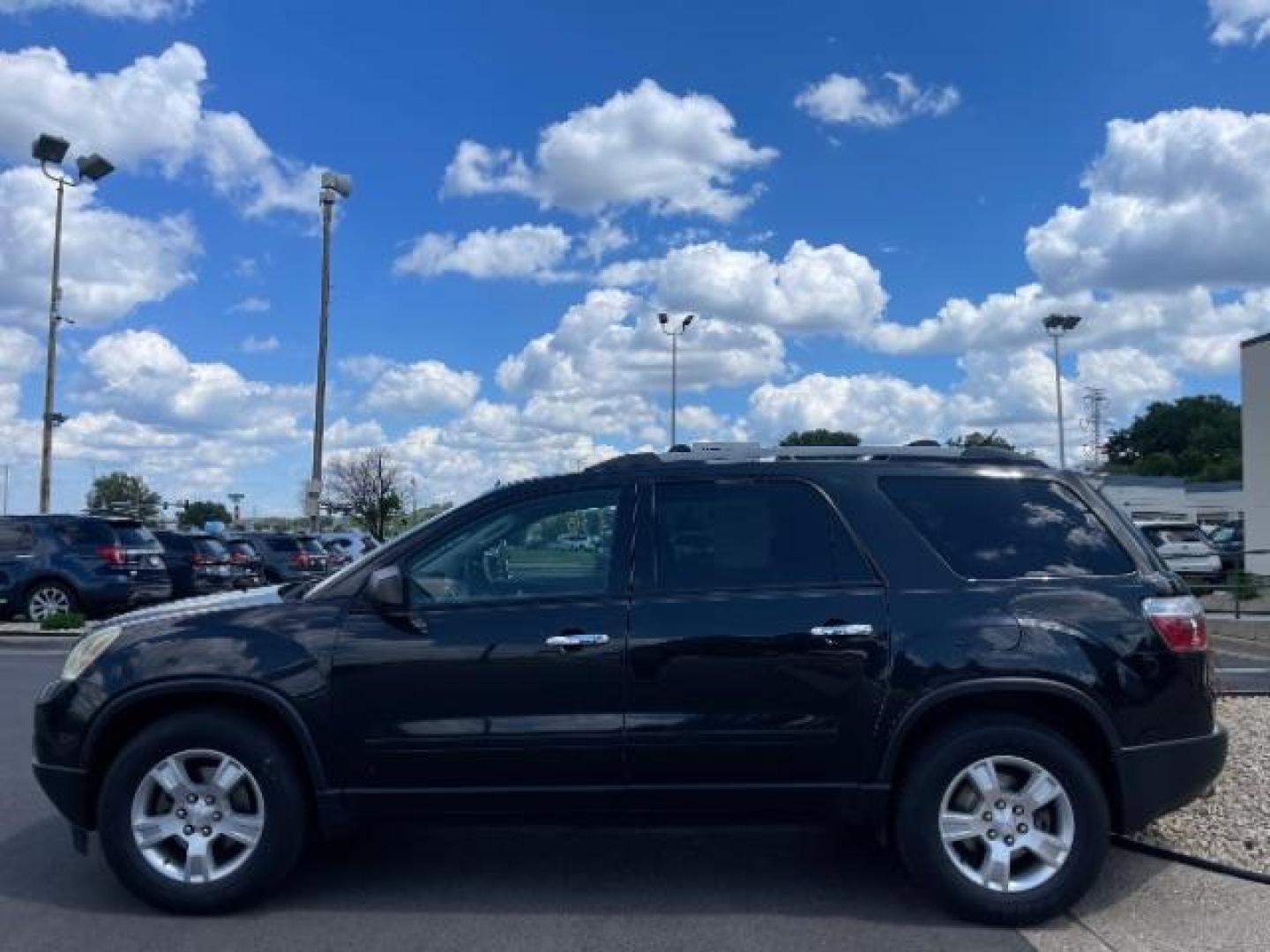 2012 Carbon Black Metalli GMC Acadia SLE-2 AWD (1GKKVPED3CJ) with an 3.6L V6 DOHC 24V engine, 6-Speed Automatic transmission, located at 3301 W Hwy 13, Burnsville, MN, 55337, (952) 460-3200, 44.775333, -93.320808 - Photo#3