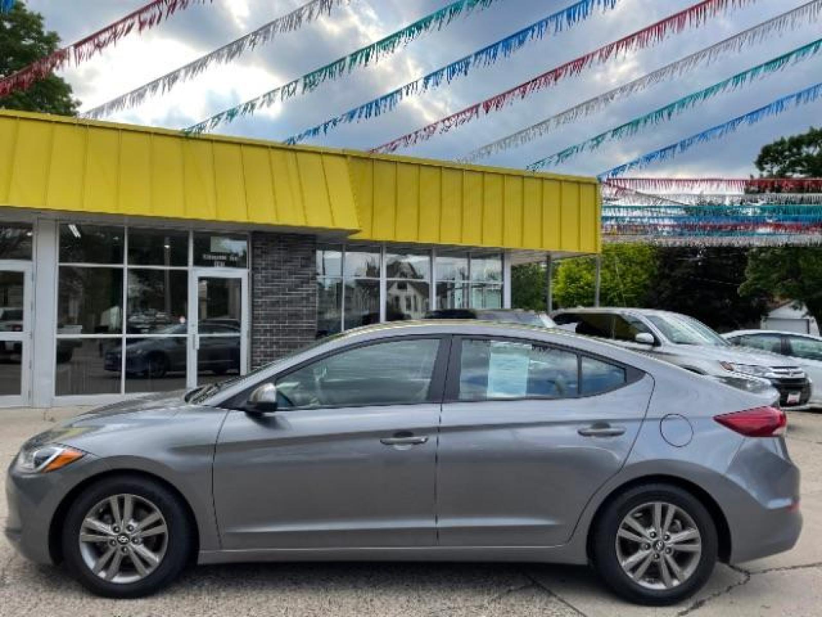 2018 Machine Gray Hyundai Elantra Limited (5NPD84LF6JH) with an 1.8L L4 DOHC 16V engine, 6-Speed Automatic transmission, located at 834 West 7th Street, St. Paul, MN, 55102, (651) 797-6393, 44.930954, -93.121559 - Photo #2