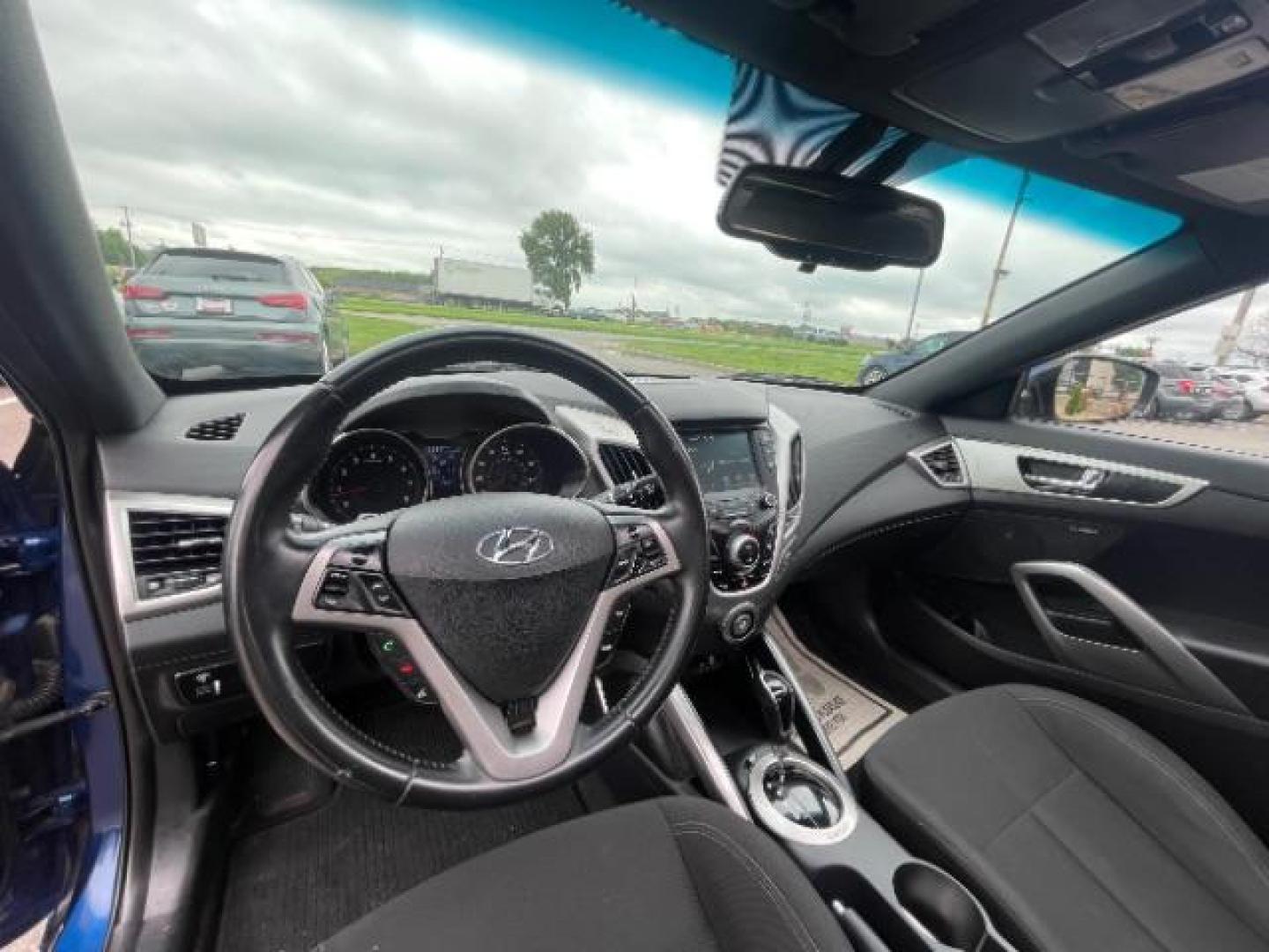 2017 Pacific Blue Hyundai Veloster Base 6AT (KMHTC6AD9HU) with an 1.6L L4 DOHC 16V engine, 6-Speed Automatic transmission, located at 745 S Robert St, St. Paul, MN, 55107, (651) 222-2991, 44.923389, -93.081215 - Photo#14