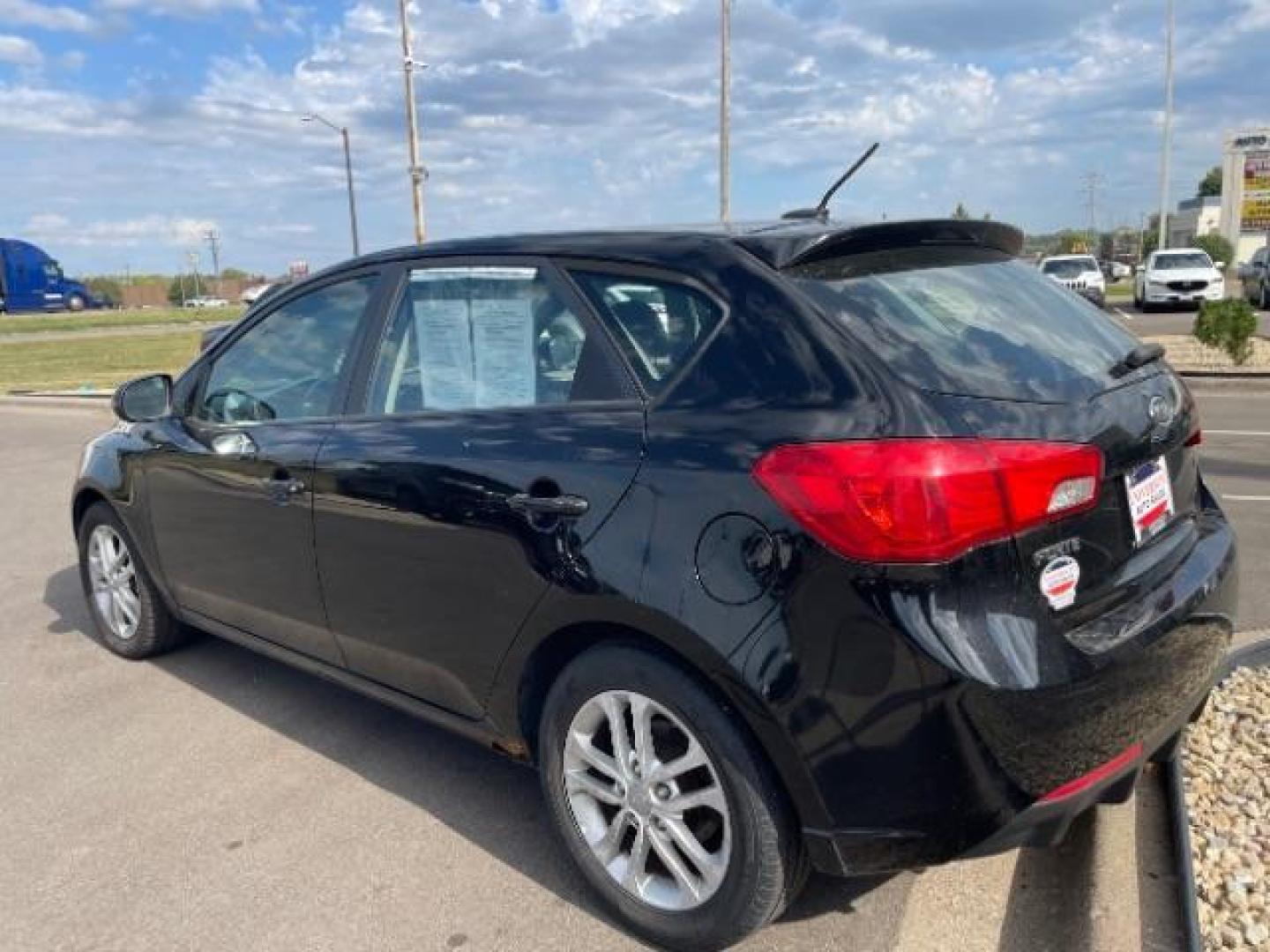 2011 Ebony Black Kia Forte 5-Door EX (KNAFU5A2XB5) with an 2.0L L4 DOHC 16V engine, located at 3301 W Hwy 13, Burnsville, MN, 55337, (952) 460-3200, 44.775333, -93.320808 - Photo#5