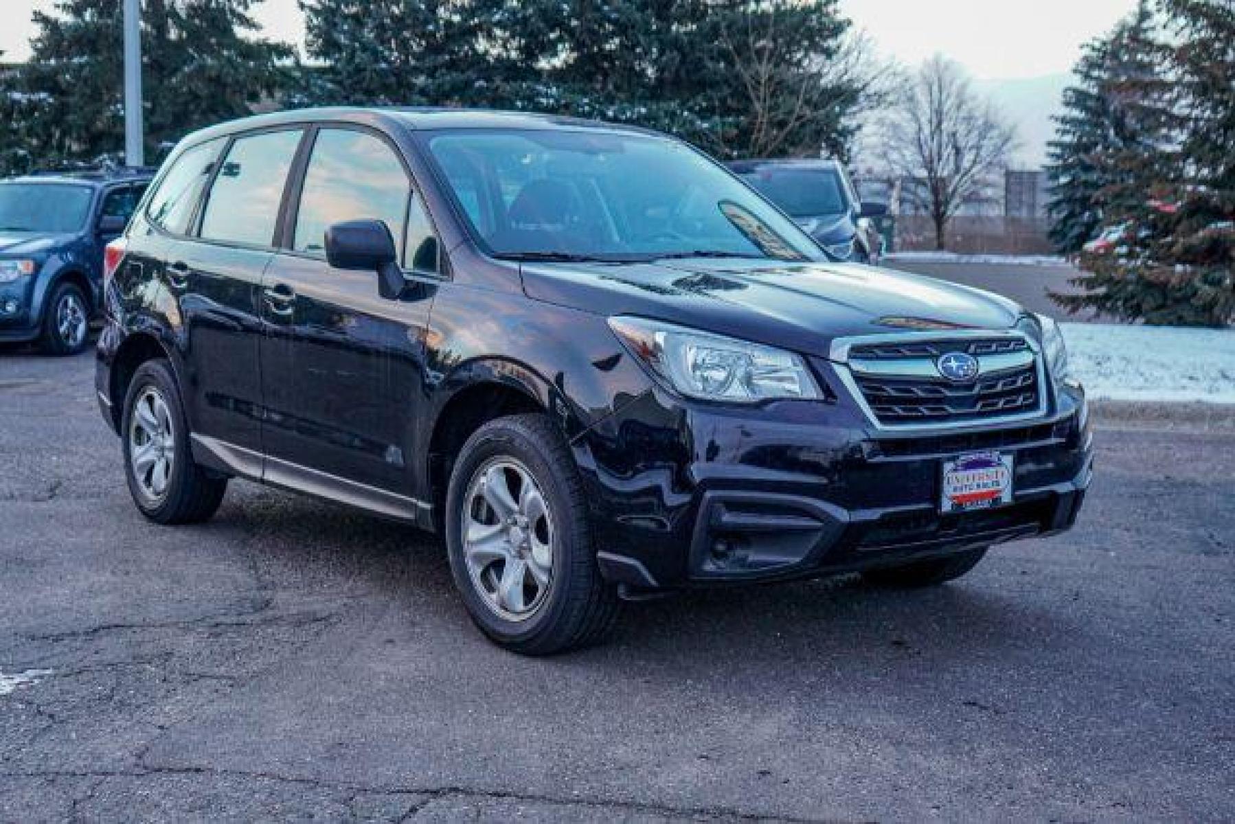 2018 Crystal Black Silica Subaru Forester 2.5i PZEV CVT (JF2SJAACXJH) with an 2.5L H4 SOHC 16V engine, Continuously Variable Transmission transmission, located at 745 S Robert St, St. Paul, MN, 55107, (651) 222-2991, 44.923389, -93.081215 - Photo #0