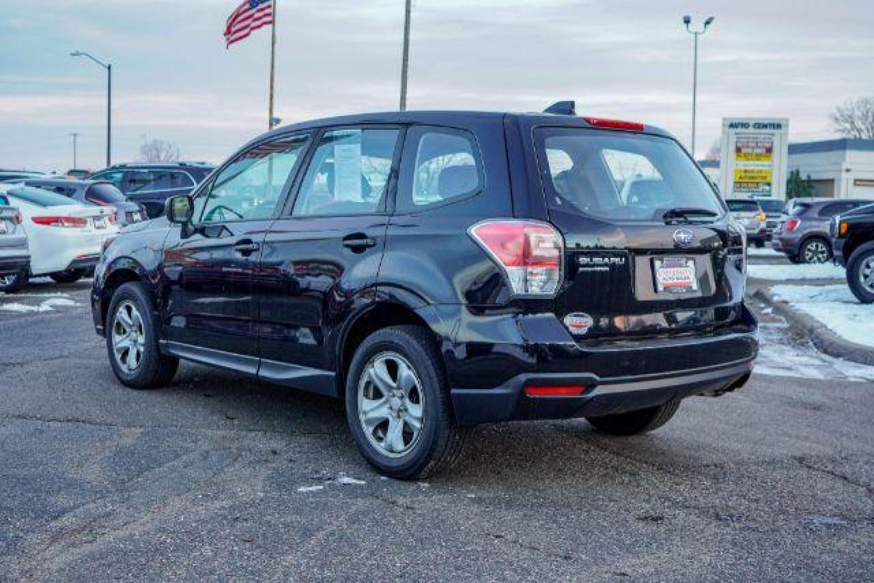 2018 Crystal Black Silica Subaru Forester 2.5i PZEV CVT (JF2SJAACXJH) with an 2.5L H4 SOHC 16V engine, Continuously Variable Transmission transmission, located at 3301 W Hwy 13, Burnsville, MN, 55337, (952) 460-3200, 44.775333, -93.320808 - Photo #4