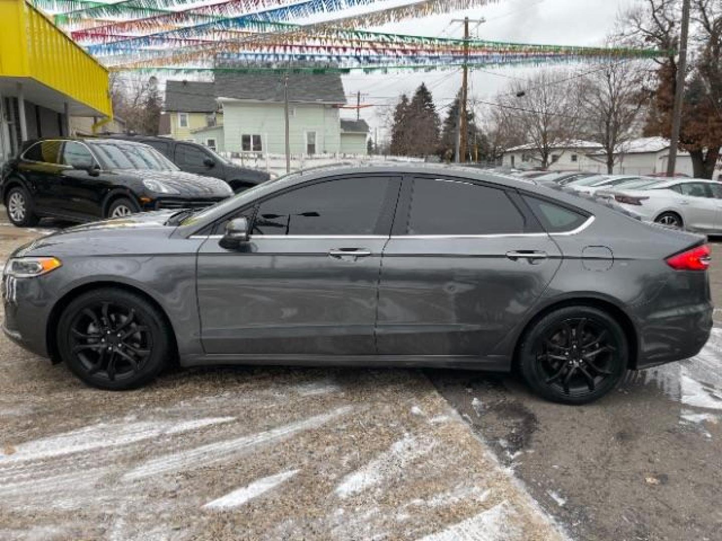 2020 GREY Ford Fusion SEL (3FA6P0CD6LR) with an 1.5L L4 DOHC 16V engine, 6-Speed Automatic transmission, located at 745 S Robert St, St. Paul, MN, 55107, (651) 222-2991, 44.923389, -93.081215 - Photo#1