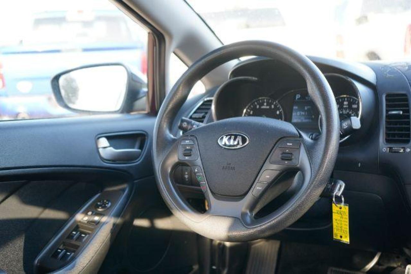 2017 Garnet Red Kia Forte LX 6M (3KPFK4A75HE) with an 2.0L L4 DOHC 16V engine, located at 3301 W Hwy 13, Burnsville, MN, 55337, (952) 460-3200, 44.775333, -93.320808 - Photo#12