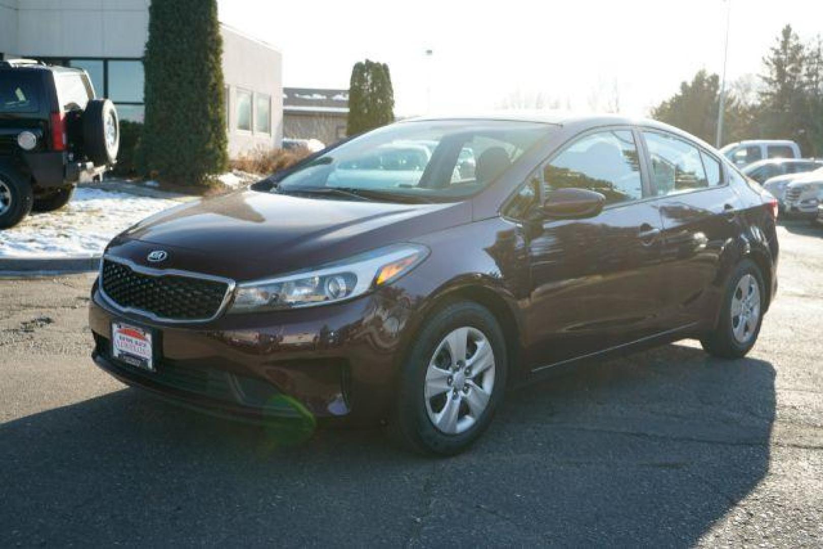 2017 Garnet Red Kia Forte LX 6M (3KPFK4A75HE) with an 2.0L L4 DOHC 16V engine, located at 3301 W Hwy 13, Burnsville, MN, 55337, (952) 460-3200, 44.775333, -93.320808 - Photo#2