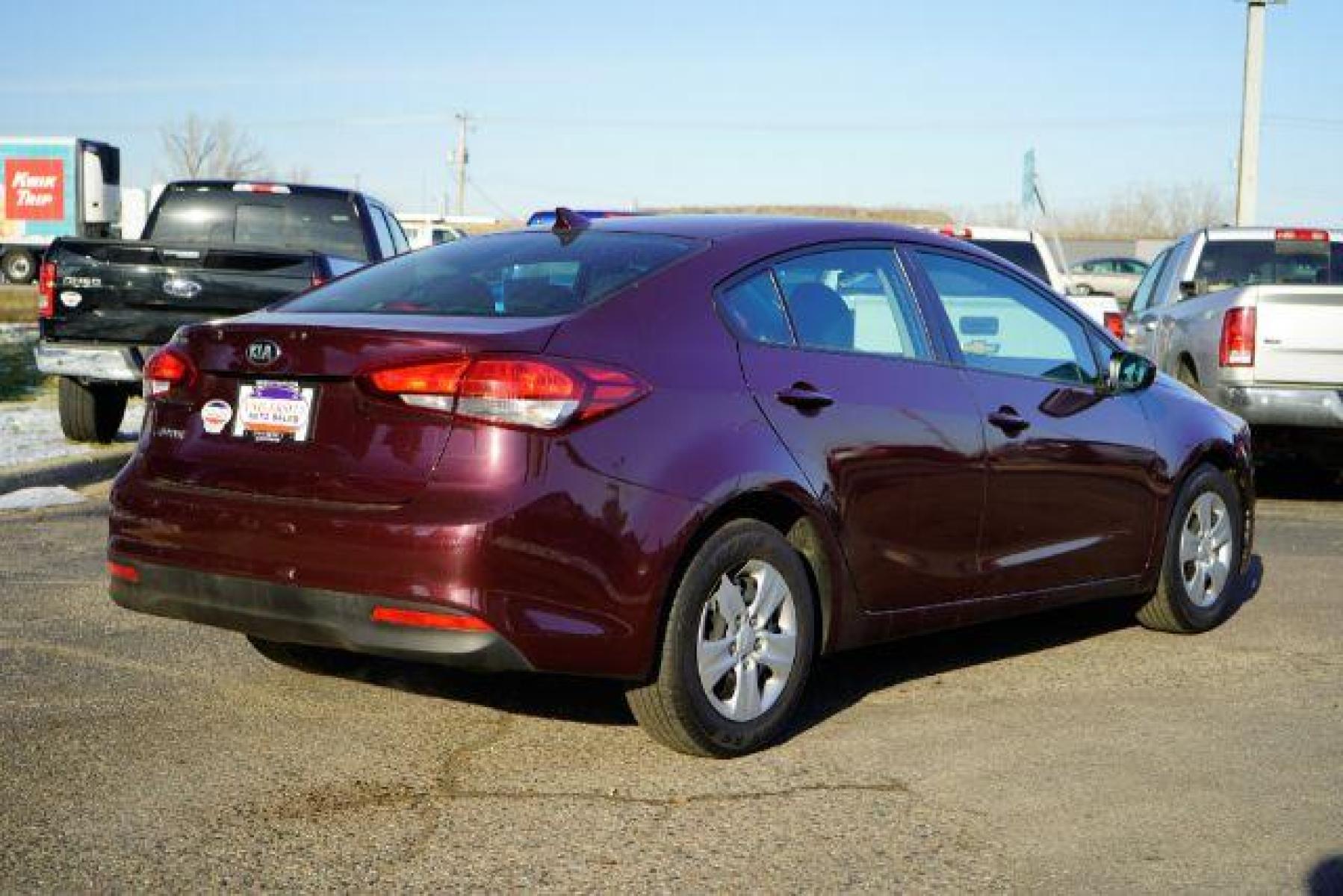2017 Garnet Red Kia Forte LX 6M (3KPFK4A75HE) with an 2.0L L4 DOHC 16V engine, 6-Speed Manual transmission, located at 745 S Robert St, St. Paul, MN, 55107, (651) 222-2991, 44.923389, -93.081215 - Photo #6