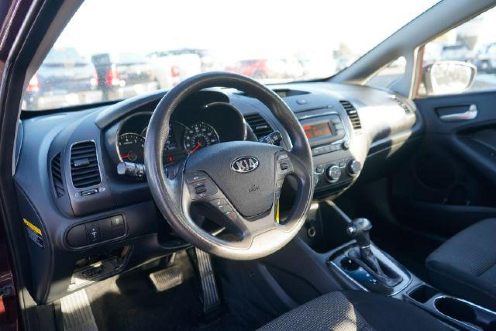 2017 Garnet Red Kia Forte LX 6M (3KPFK4A75HE) with an 2.0L L4 DOHC 16V engine, located at 3301 W Hwy 13, Burnsville, MN, 55337, (952) 460-3200, 44.775333, -93.320808 - Photo#8