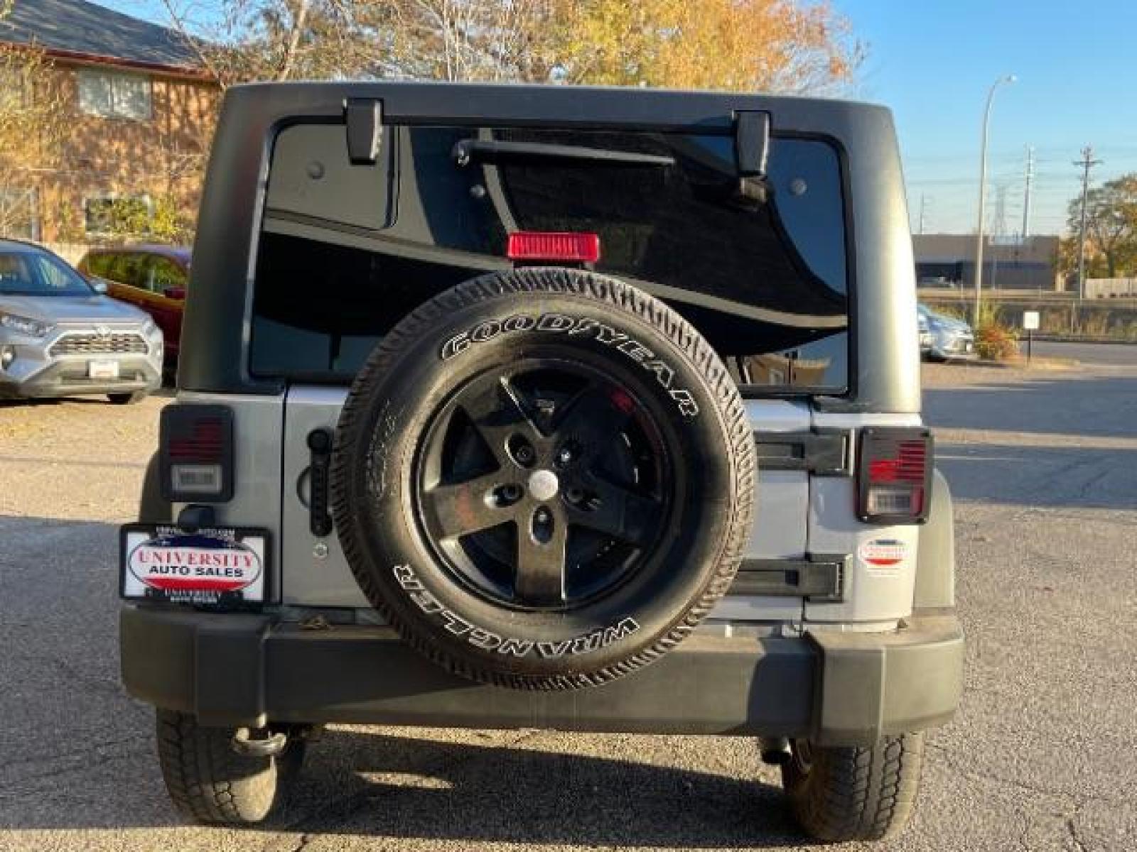 2017 Billet Silver Metallic Clear Coat Jeep Wrangler Unlimited Sport 4WD (1C4HJWDG8HL) with an 3.6L V6 DOHC 24V FFV engine, located at 616 E. 78th St, Richfield, MN, 55423, (612) 866-0331, 44.862831, -93.267143 - Photo #11