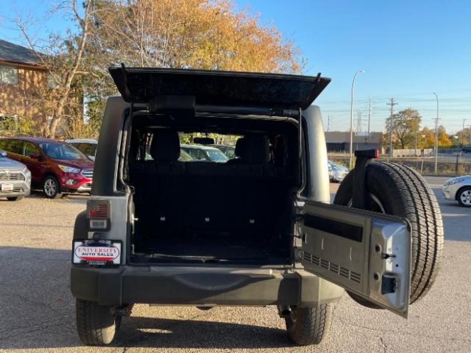 2017 Billet Silver Metallic Clear Coat Jeep Wrangler Unlimited Sport 4WD (1C4HJWDG8HL) with an 3.6L V6 DOHC 24V FFV engine, located at 745 S Robert St, St. Paul, MN, 55107, (651) 222-2991, 44.923389, -93.081215 - Photo #14