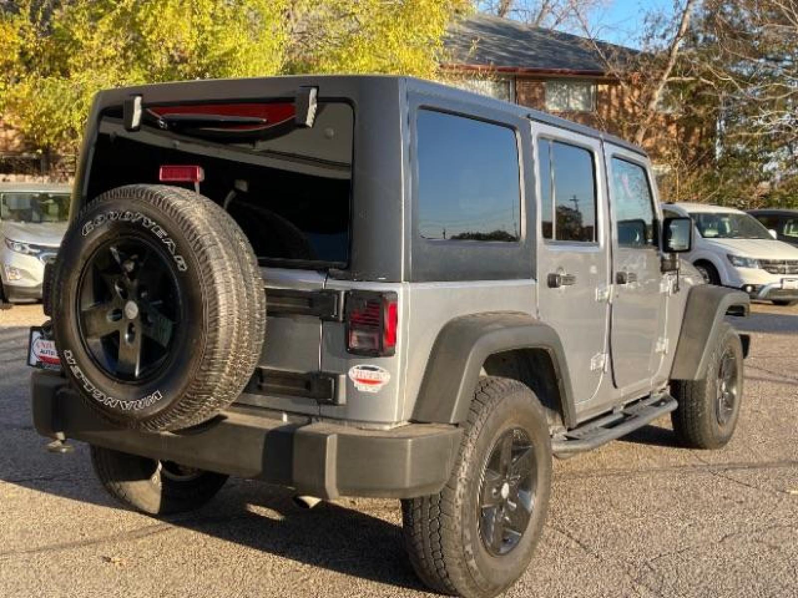 2017 Billet Silver Metallic Clear Coat Jeep Wrangler Unlimited Sport 4WD (1C4HJWDG8HL) with an 3.6L V6 DOHC 24V FFV engine, located at 616 E. 78th St, Richfield, MN, 55423, (612) 866-0331, 44.862831, -93.267143 - Photo #17