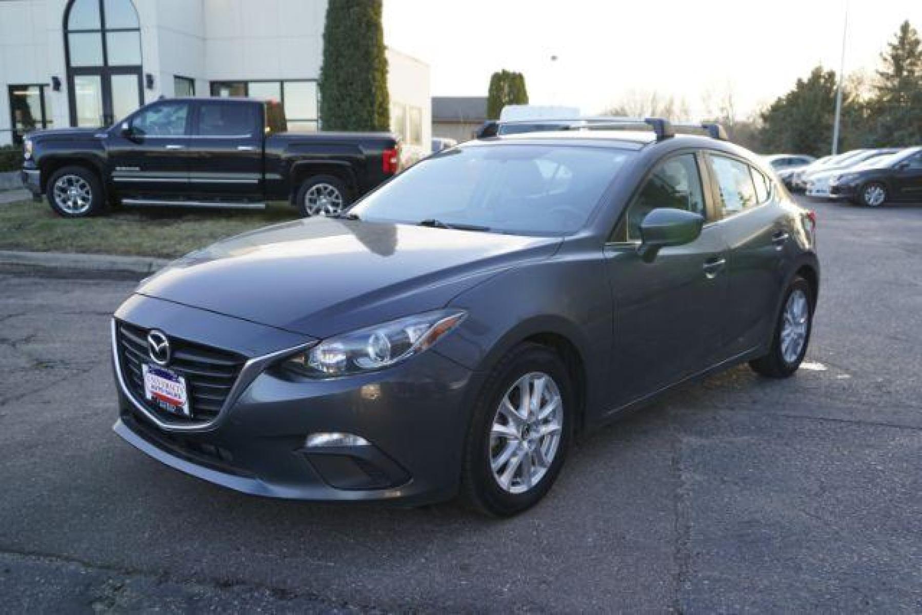 2014 GREY Mazda MAZDA3 i Grand Touring AT 5-Door (JM1BM1M71E1) with an 2.0L L4 DOHC 16V engine, 6-Speed Automatic transmission, located at 745 S Robert St, St. Paul, MN, 55107, (651) 222-2991, 44.923389, -93.081215 - Photo #2