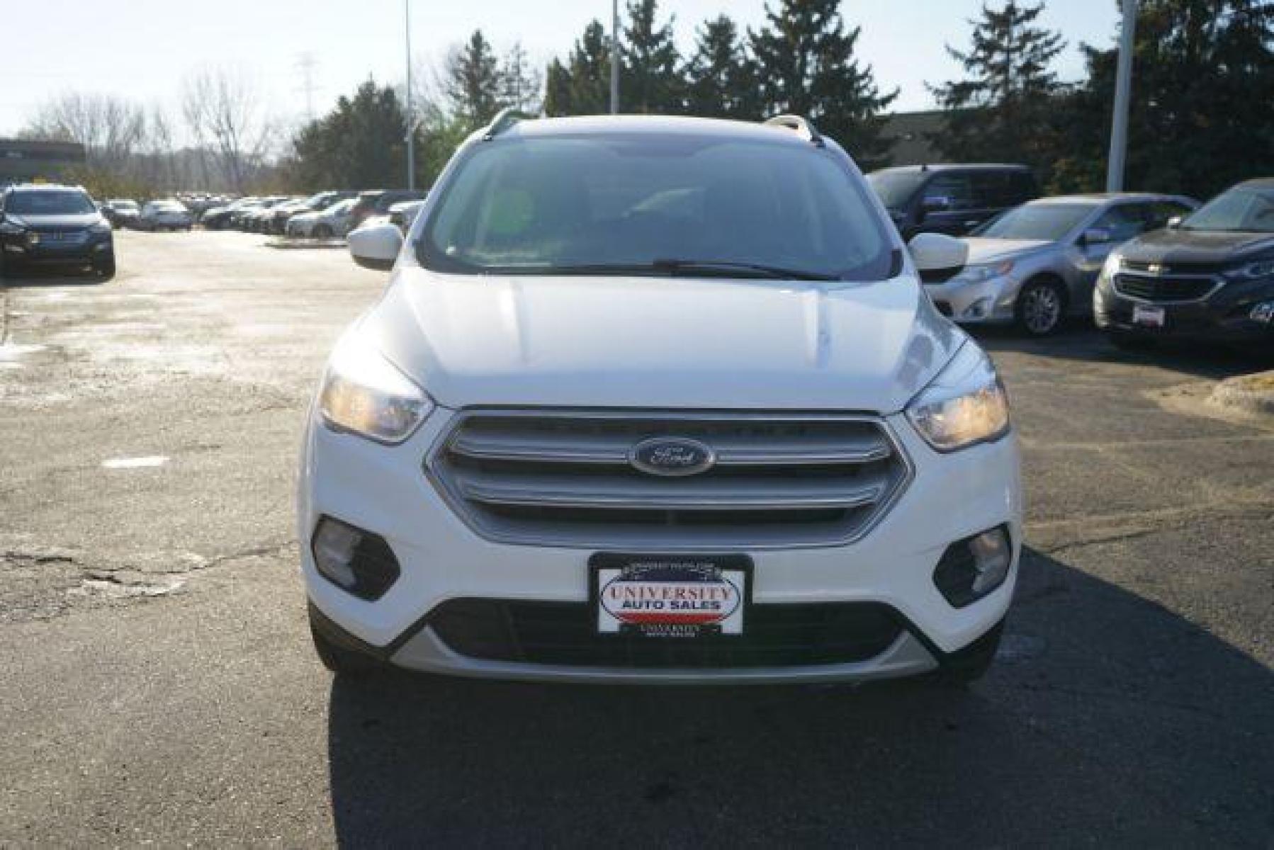2018 Oxford White Ford Escape SE 4WD (1FMCU9GD7JU) with an 1.5L L4 DOHC 16V engine, 6-Speed Automatic transmission, located at 3301 W Hwy 13, Burnsville, MN, 55337, (952) 460-3200, 44.775333, -93.320808 - Photo #1