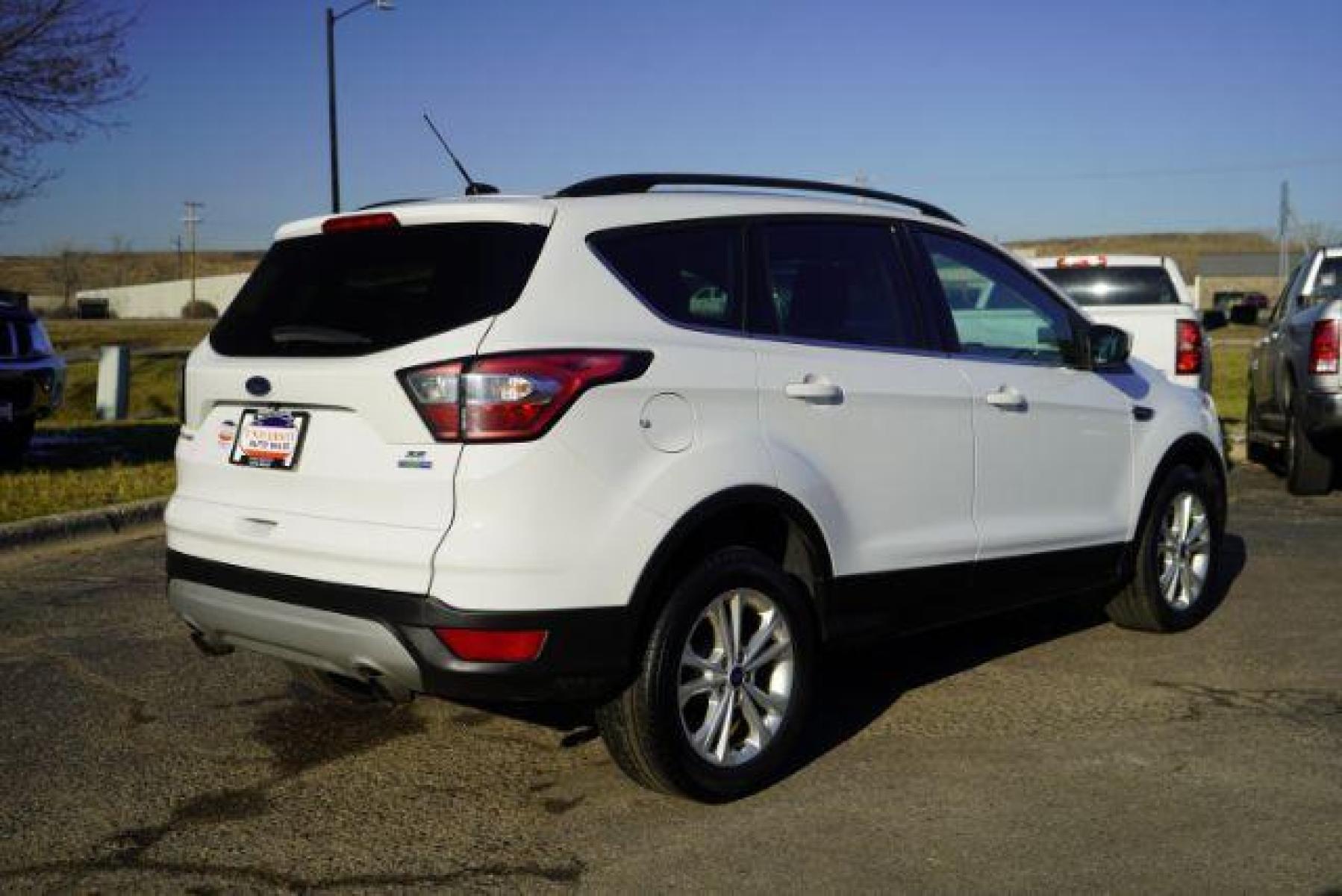 2018 Oxford White Ford Escape SE 4WD (1FMCU9GD7JU) with an 1.5L L4 DOHC 16V engine, 6-Speed Automatic transmission, located at 3301 W Hwy 13, Burnsville, MN, 55337, (952) 460-3200, 44.775333, -93.320808 - Photo #5