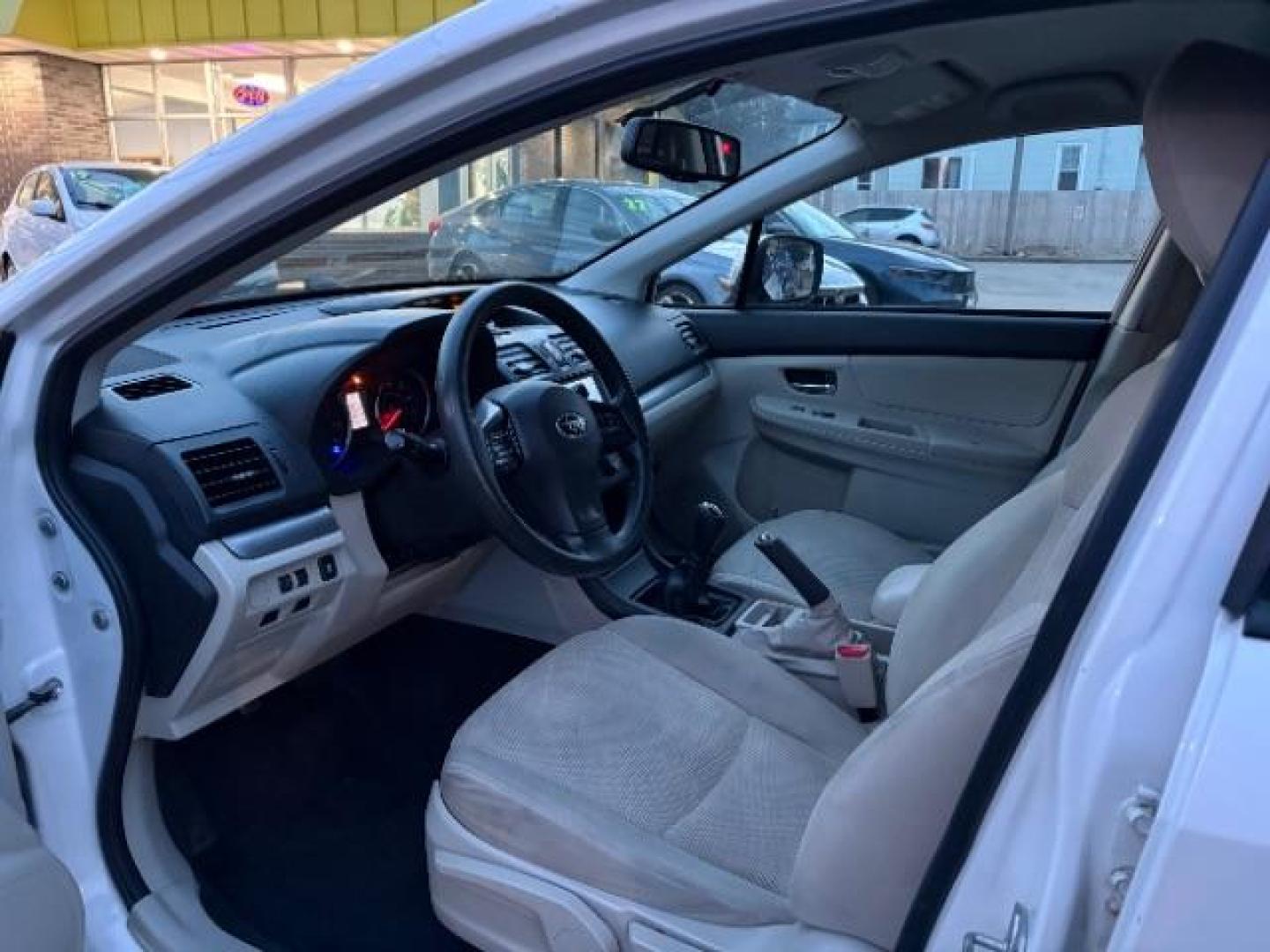 2013 Satin White Pearl Subaru XV Crosstrek 2.0 Limited (JF2GPACC7DG) with an 2.0L L4 DOHC 16V engine, 5-Speed Manual transmission, located at 745 S Robert St, St. Paul, MN, 55107, (651) 222-2991, 44.923389, -93.081215 - Photo#4