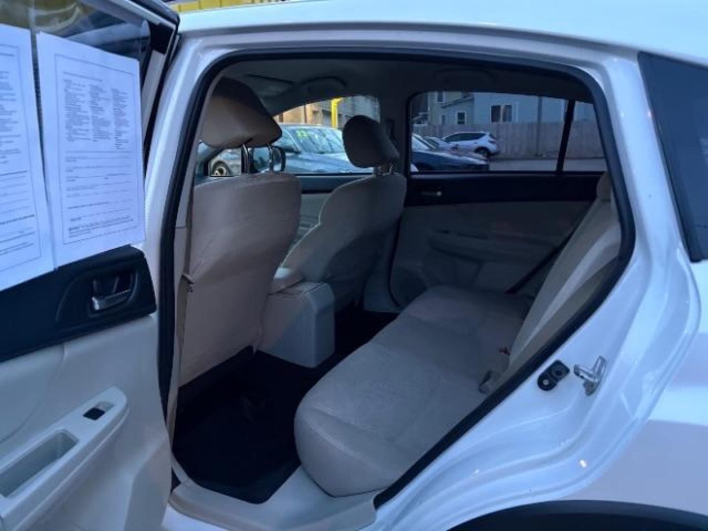 2013 Satin White Pearl Subaru XV Crosstrek 2.0 Limited (JF2GPACC7DG) with an 2.0L L4 DOHC 16V engine, 5-Speed Manual transmission, located at 745 S Robert St, St. Paul, MN, 55107, (651) 222-2991, 44.923389, -93.081215 - Photo#7
