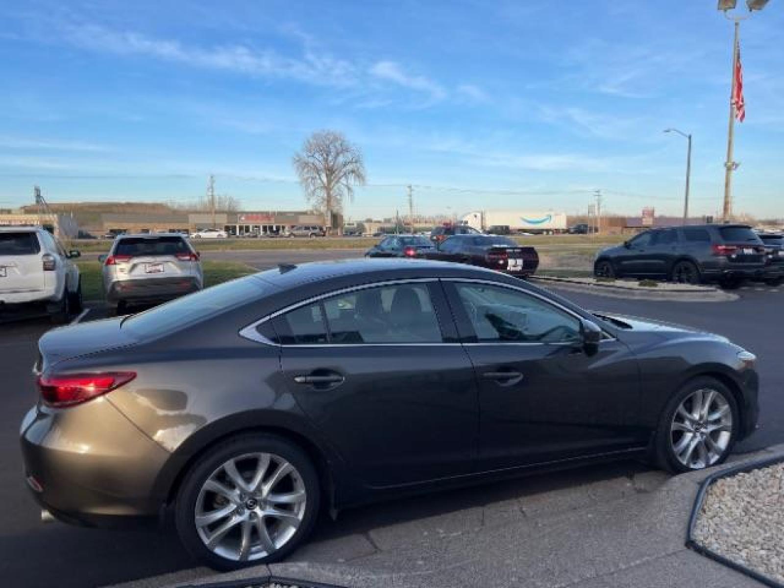 2017 BROWN Mazda Mazda6 i Touring AT (JM1GL1V56H1) with an 2.5L L4 DOHC 16V engine, 6-Speed Automatic transmission, located at 3301 W Hwy 13, Burnsville, MN, 55337, (952) 460-3200, 44.775333, -93.320808 - Photo #6