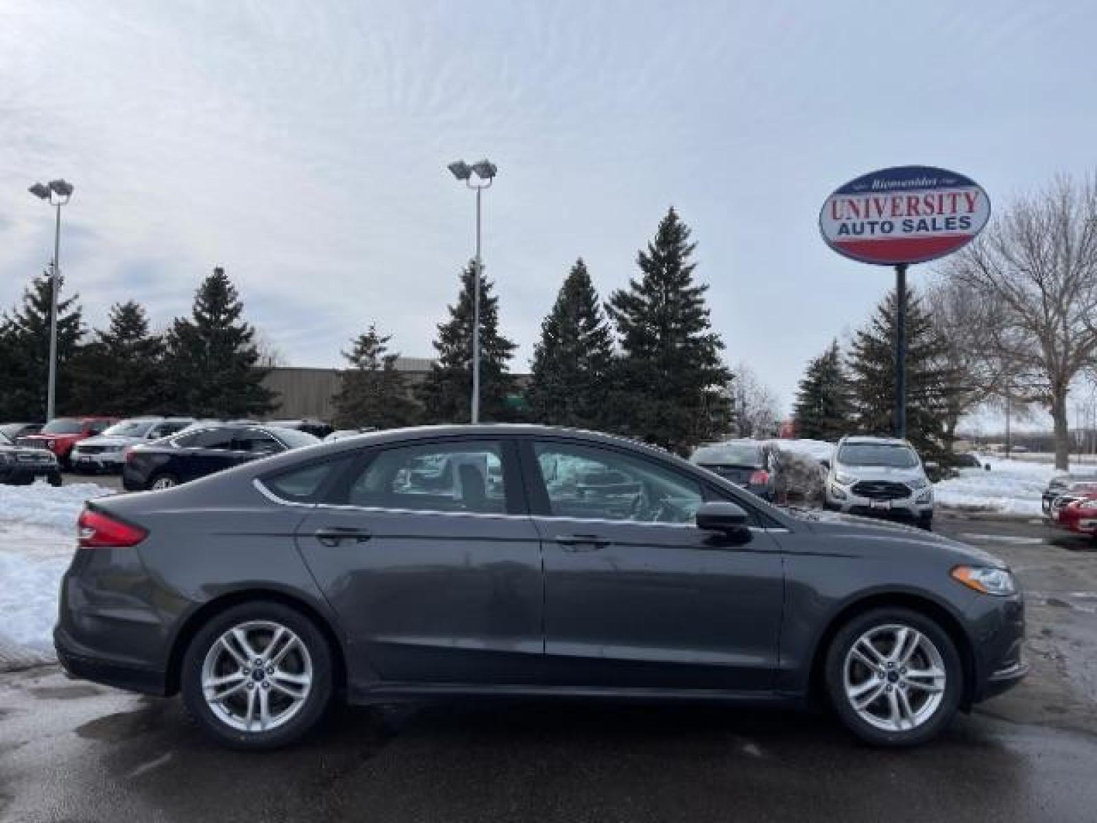 2018 Magnetic Metallic Ford Fusion SE (3FA6P0H74JR) with an 2.5L L4 DOHC 16V engine, 6-Speed Automatic transmission, located at 3301 W Hwy 13, Burnsville, MN, 55337, (952) 460-3200, 44.775333, -93.320808 - Photo #4